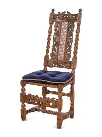 An Assembled Set of Eight English Baroque Walnut Cane-Upholstered Dining Chairs
