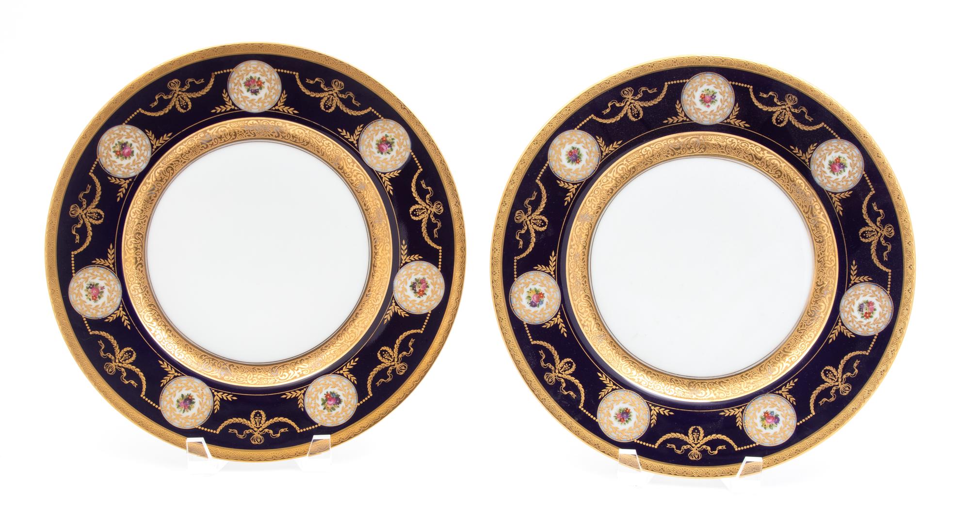 A Set of Twelve Hutchenreuther Polychrome Gilt Decorated Porcelain Plates — 20TH CENTURY