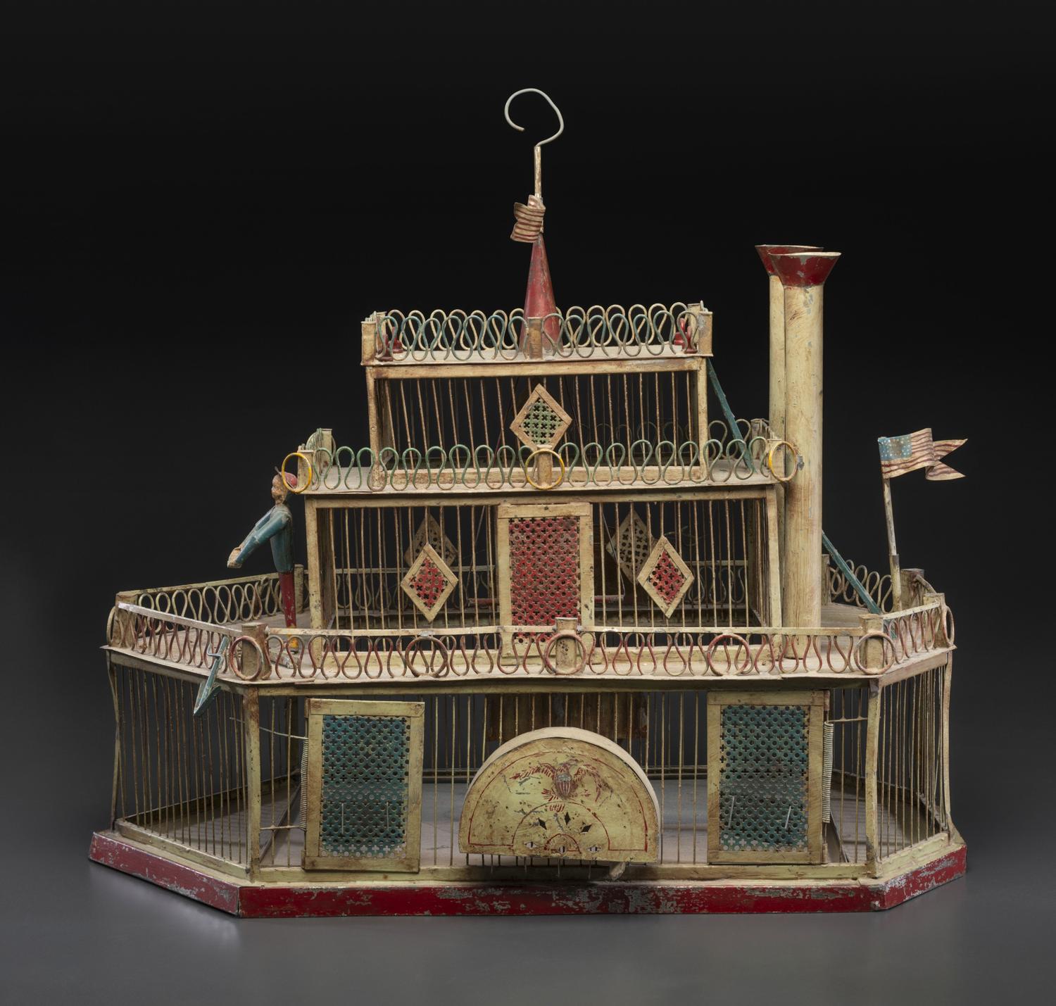 A Painted Sheet Metal and Wire Steamboat Form Birdcage