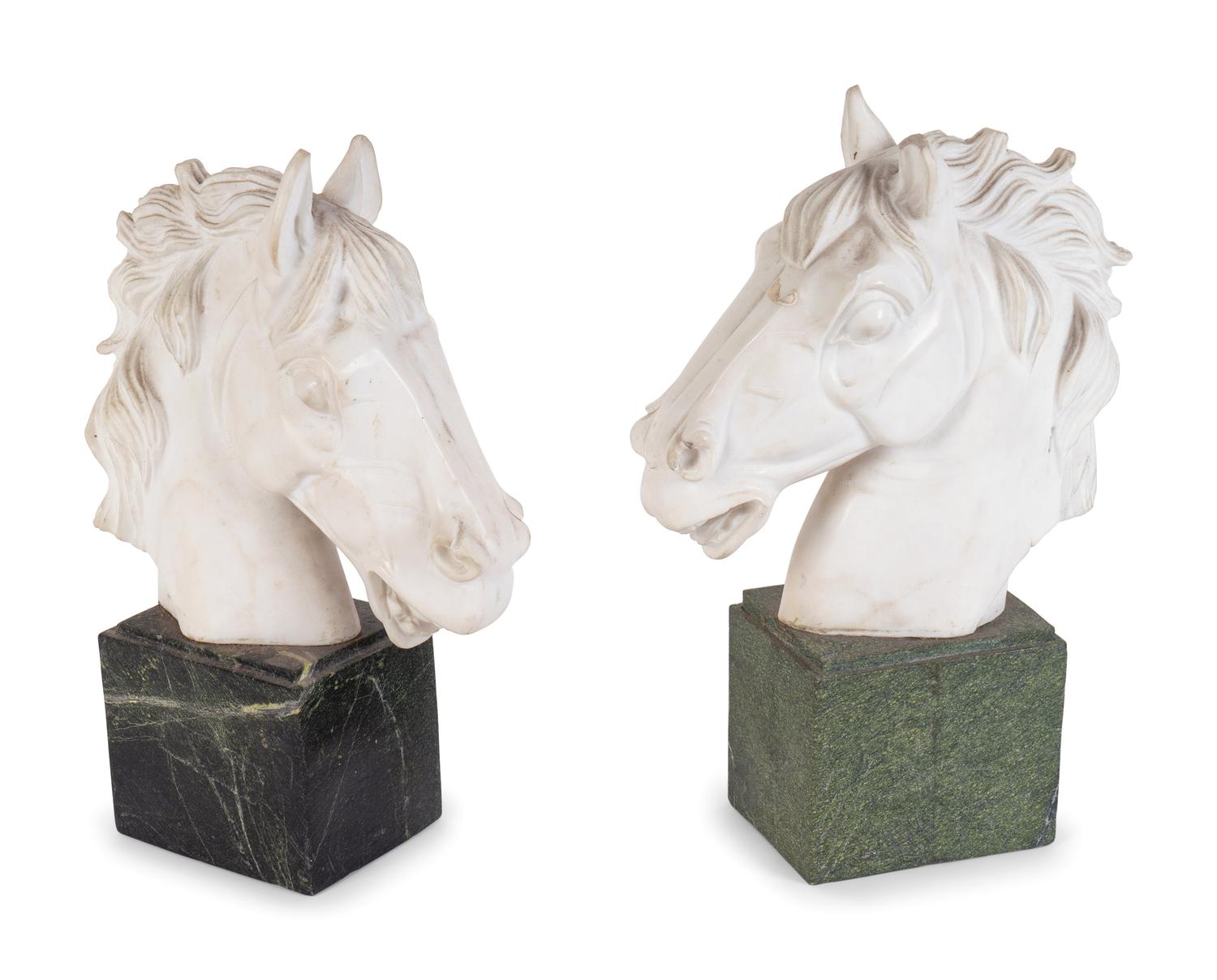 A Pair of Continental Carved Marble Horse Heads — FIRST QUARTER 20TH CENTURY