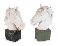 A Pair of Continental Carved Marble Horse Heads — FIRST QUARTER 20TH CENTURY