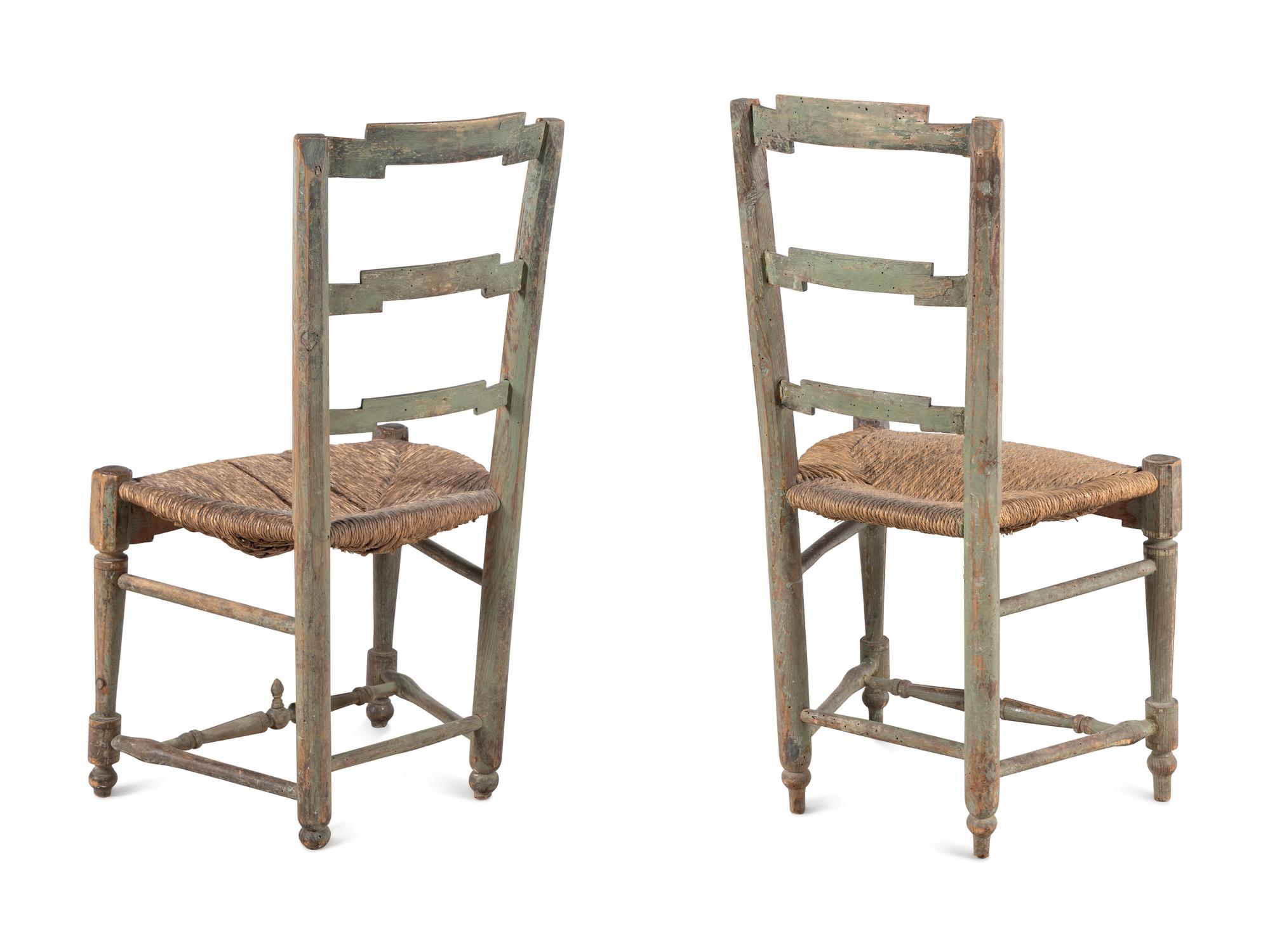 A Pair of French Carved and Painted Rush Seat Side Chairs