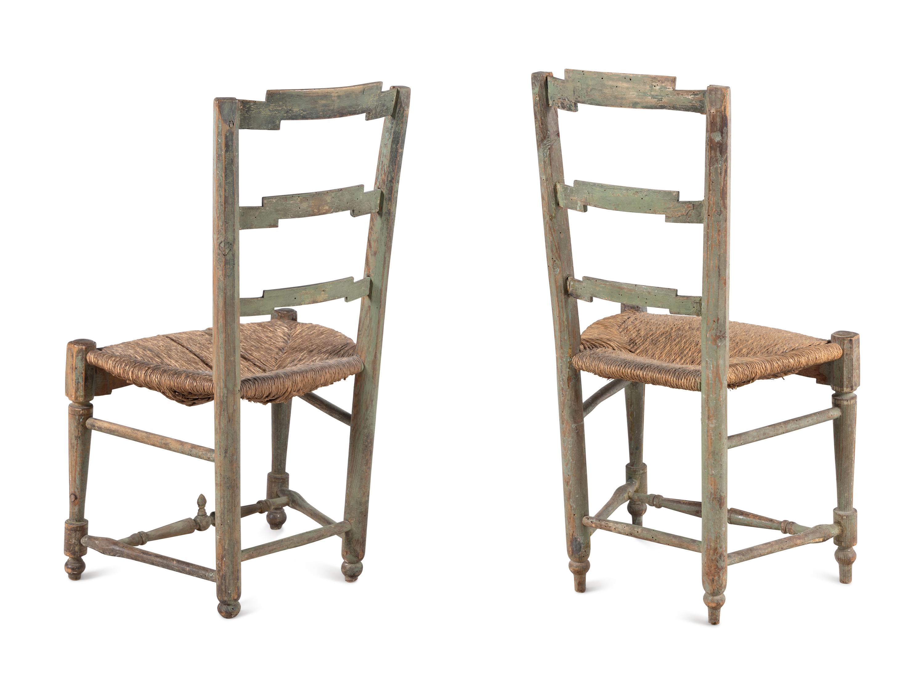 A Pair of French Carved and Painted Rush Seat Side Chairs