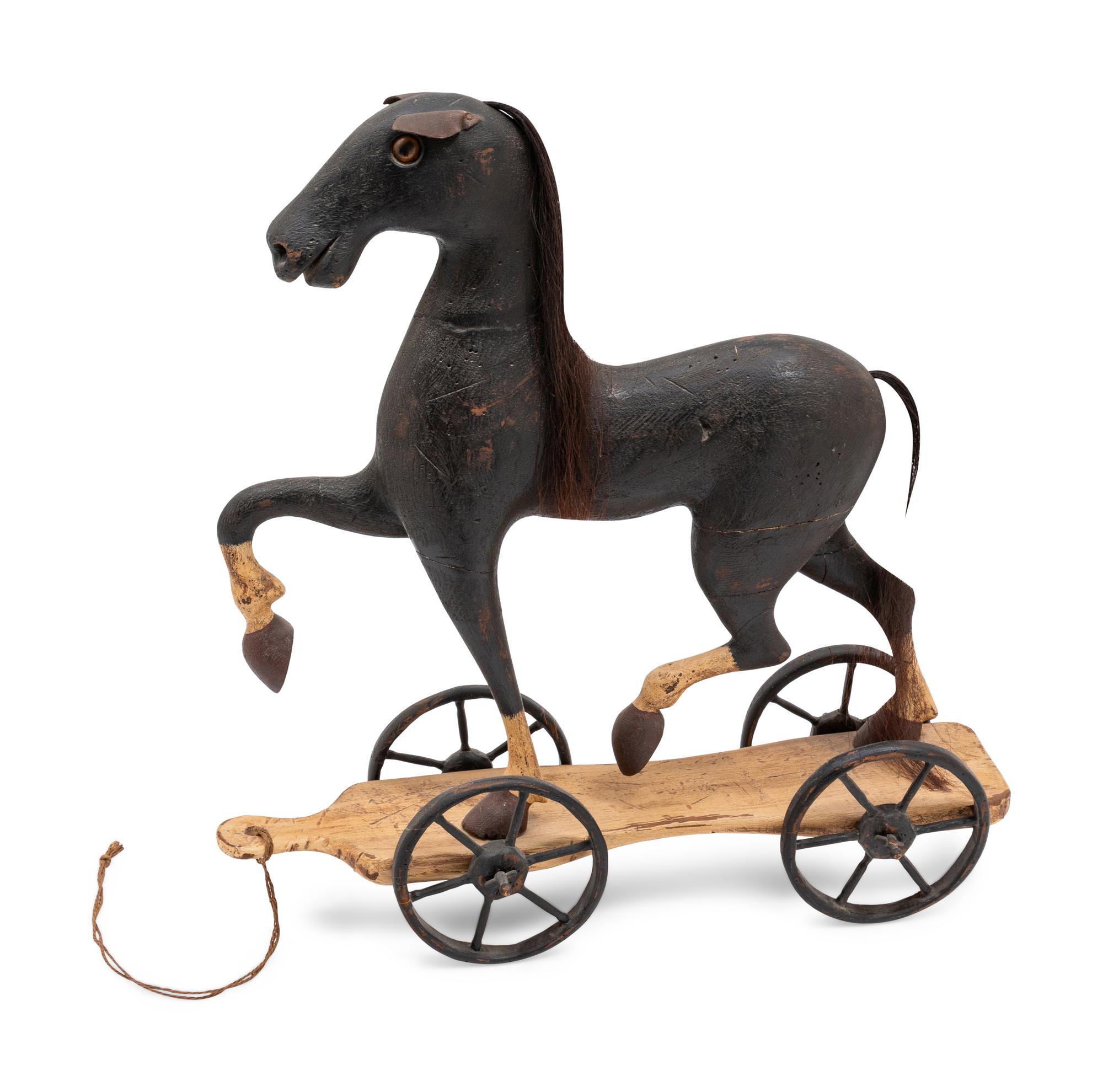 A Carved Folk Art Pull Toy