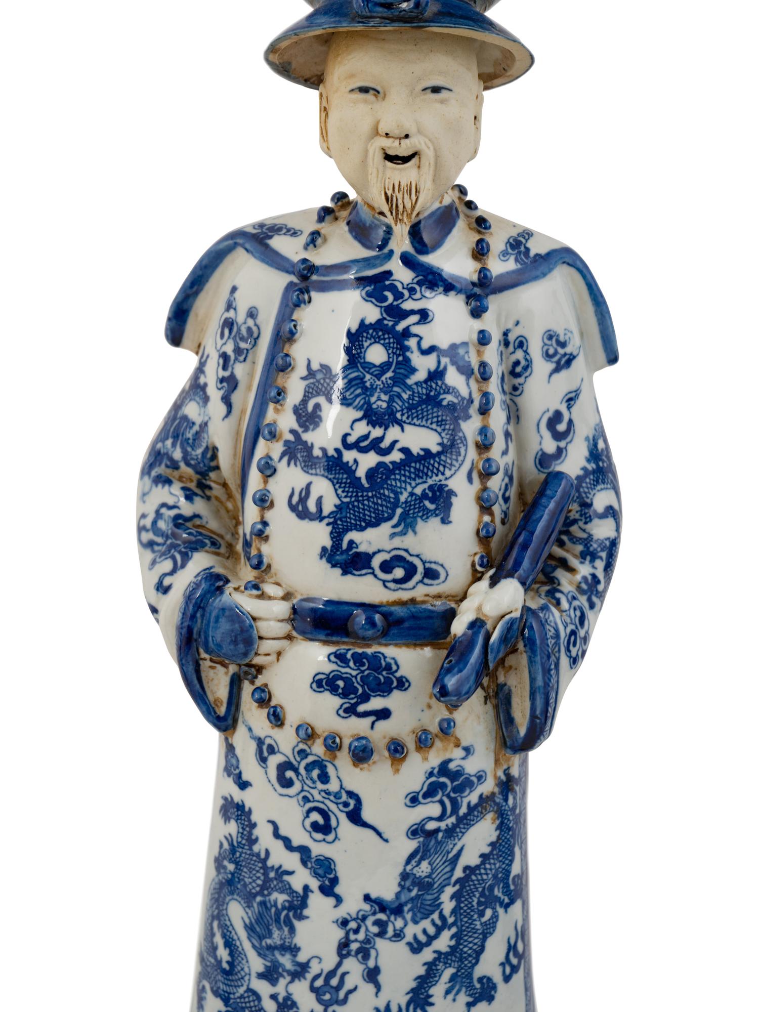 A Group of Three Chinese Blue and White Porcelain Figures of Officials — 20TH CENTURY