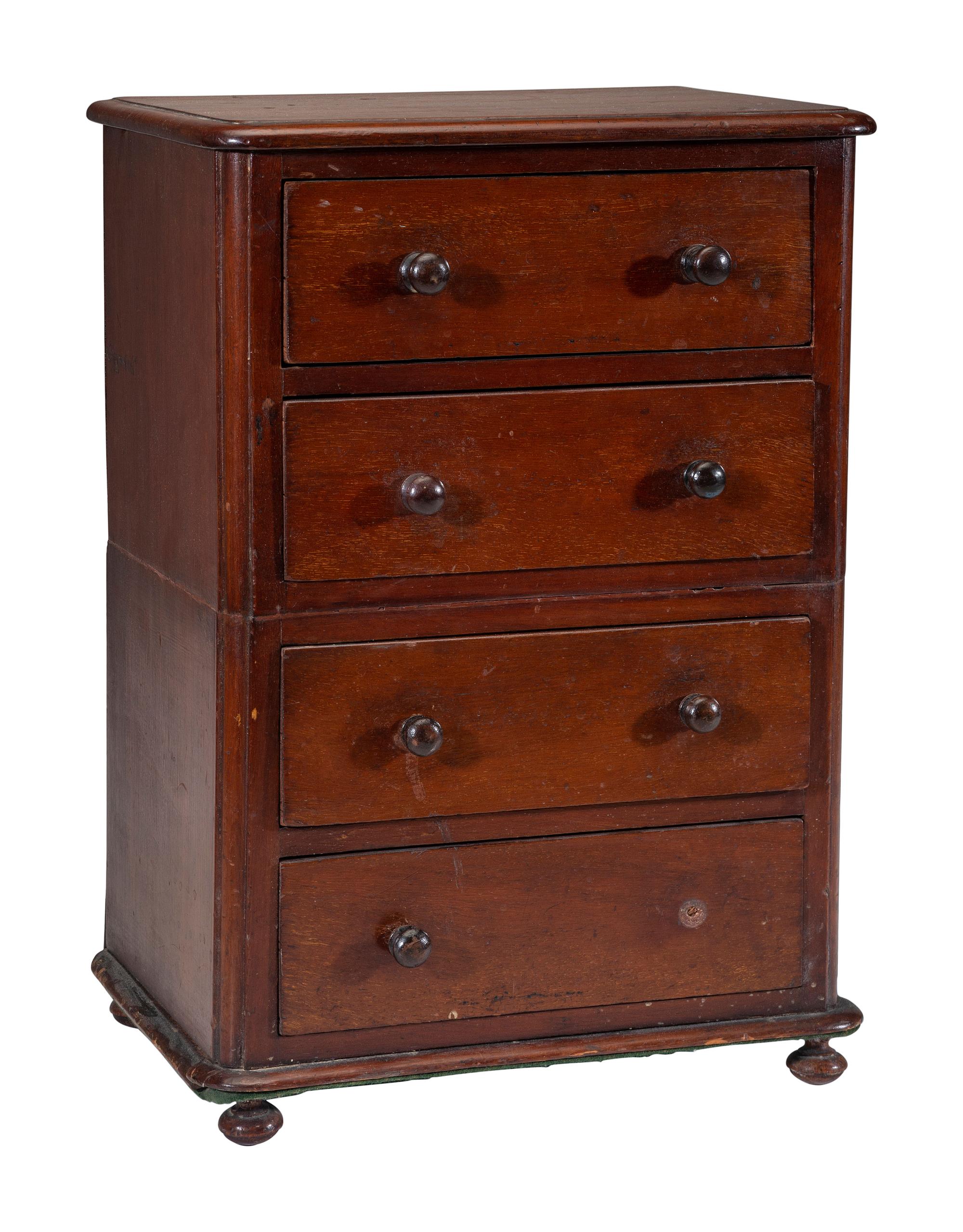 A Miniature Cherry Four-Drawer Chest