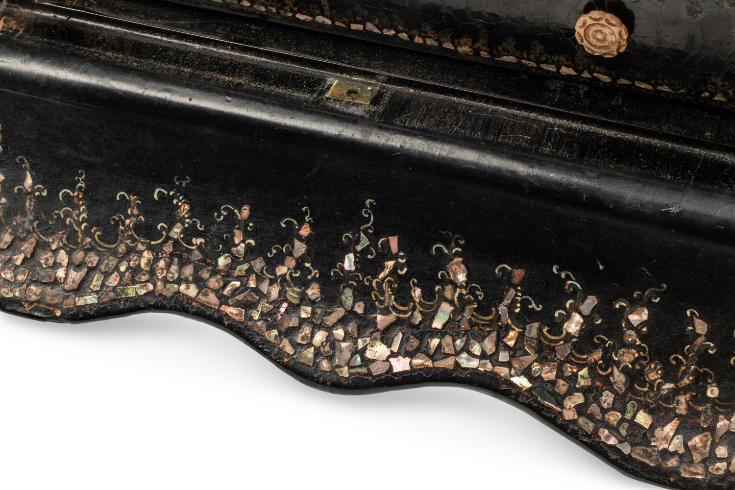 An English Mother-of-Pearl Inlaid Ebonized Cabinet