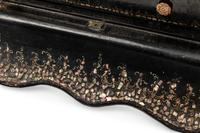 An English Mother-of-Pearl Inlaid Ebonized Cabinet