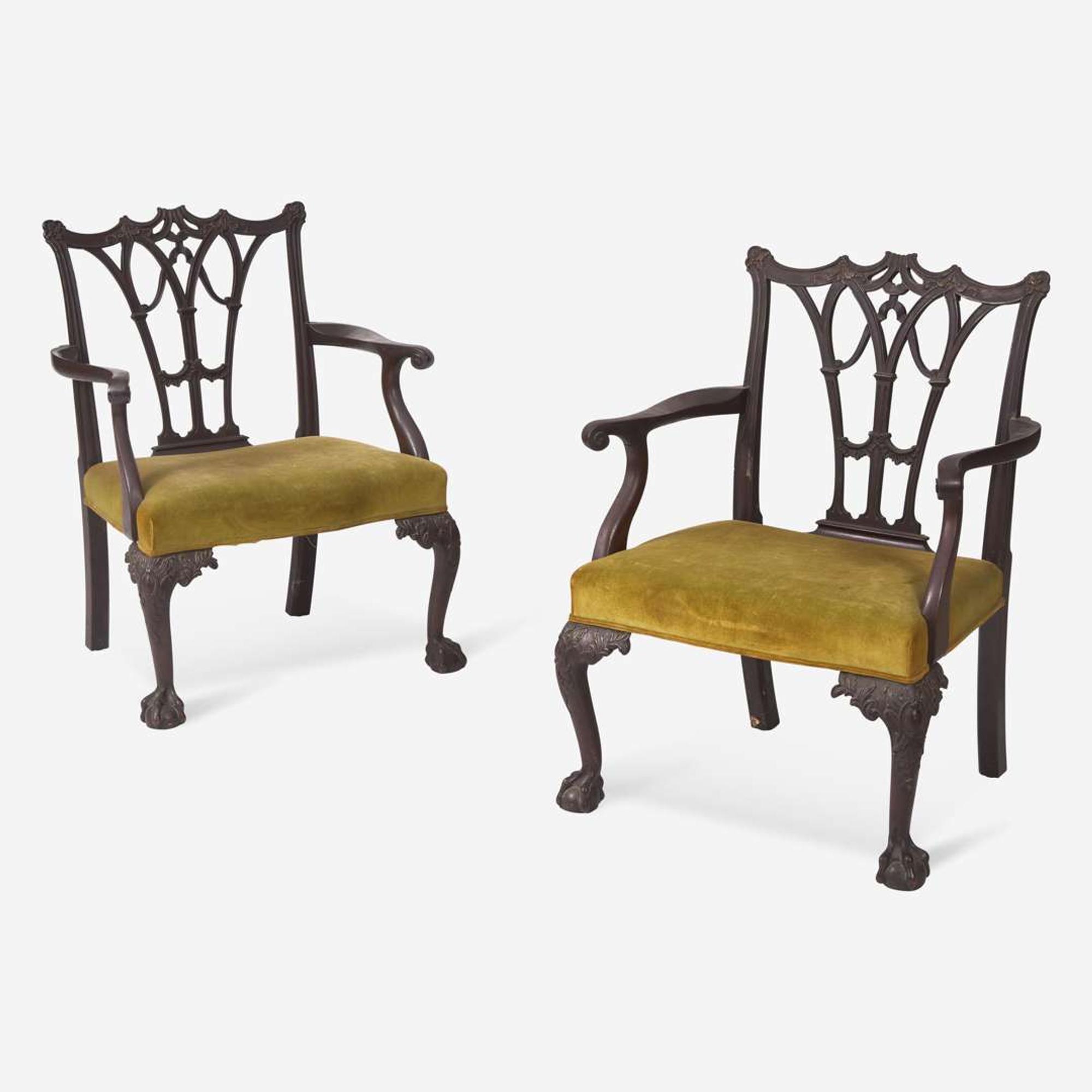 A pair of George III-style Chinoiserie carved mahogany armchairs England, 19th century