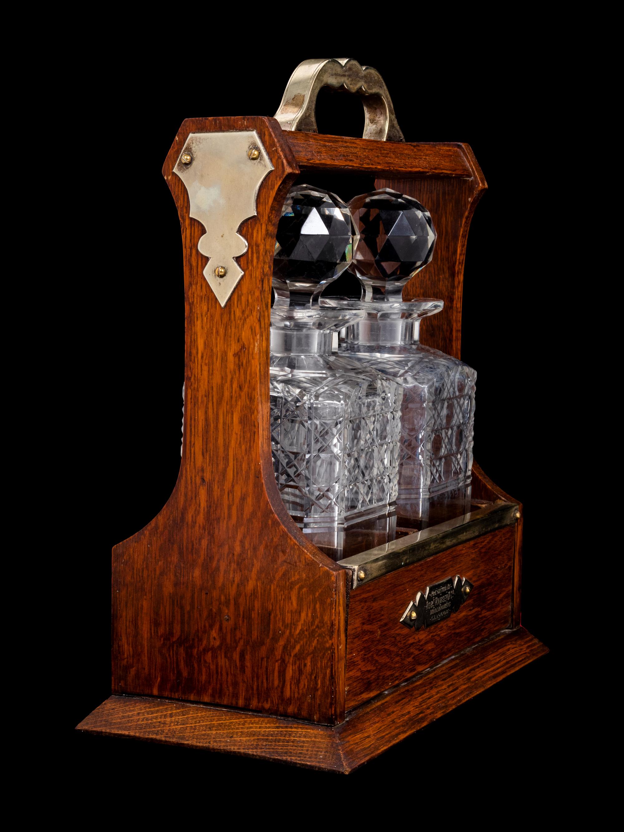 A Scottish Silver-Plate, Oak and Cut Glass Tantalus