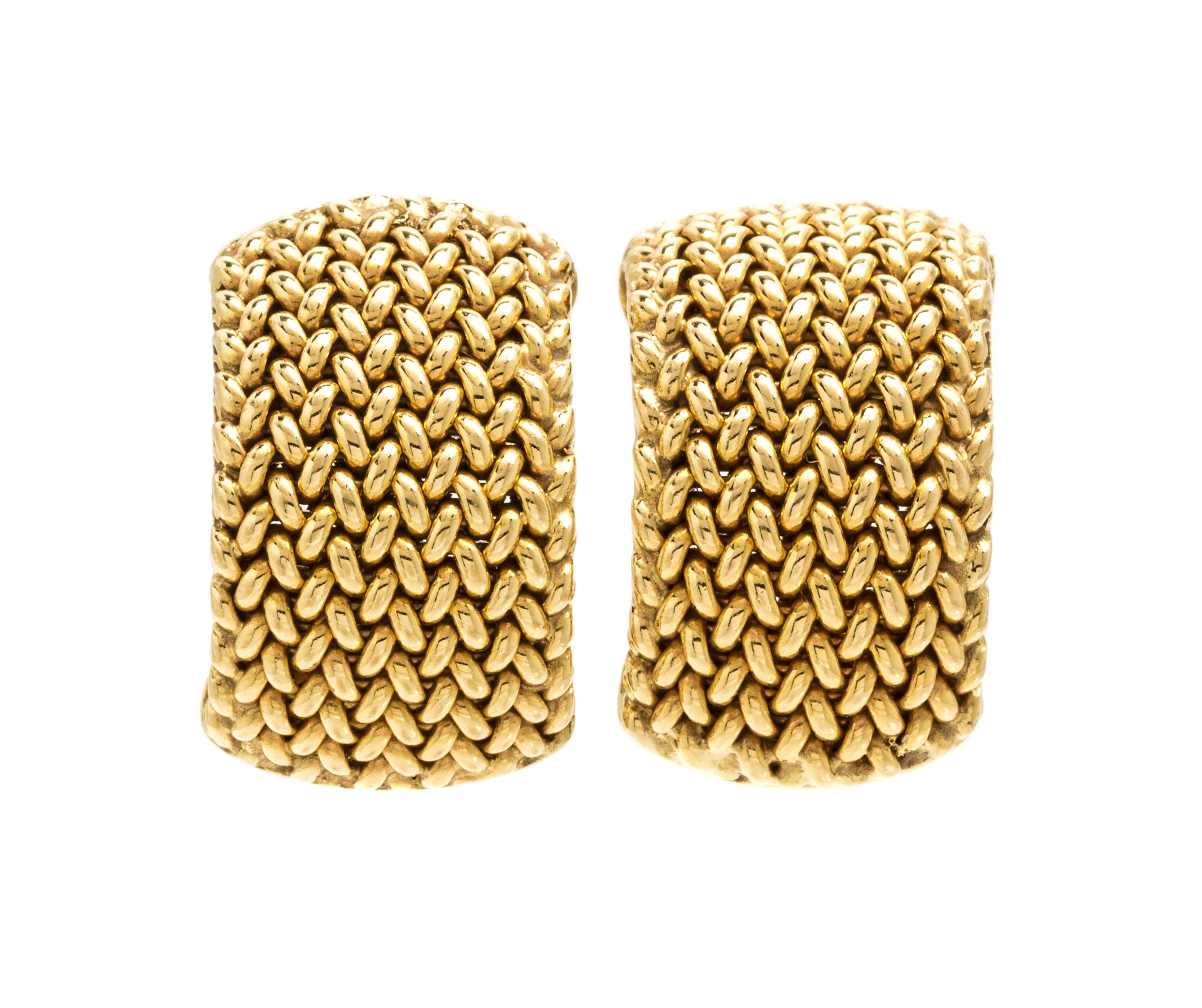 A Pair of 14 Karat Yellow Gold Earclips, 11.00 dwts.