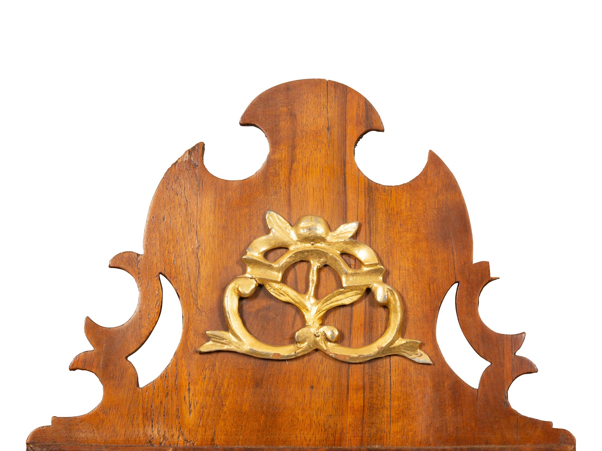 A George III Parcel Gilt Mahogany Mirror