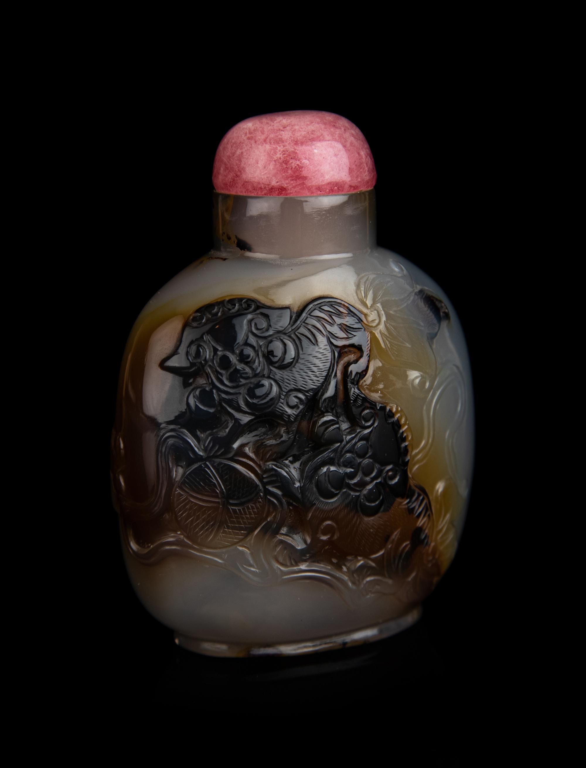 A Chinese Carved Agate 'Fu Lion' Snuff Bottle