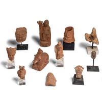 Twenty-One Egyptian Terracotta Heads and Figures