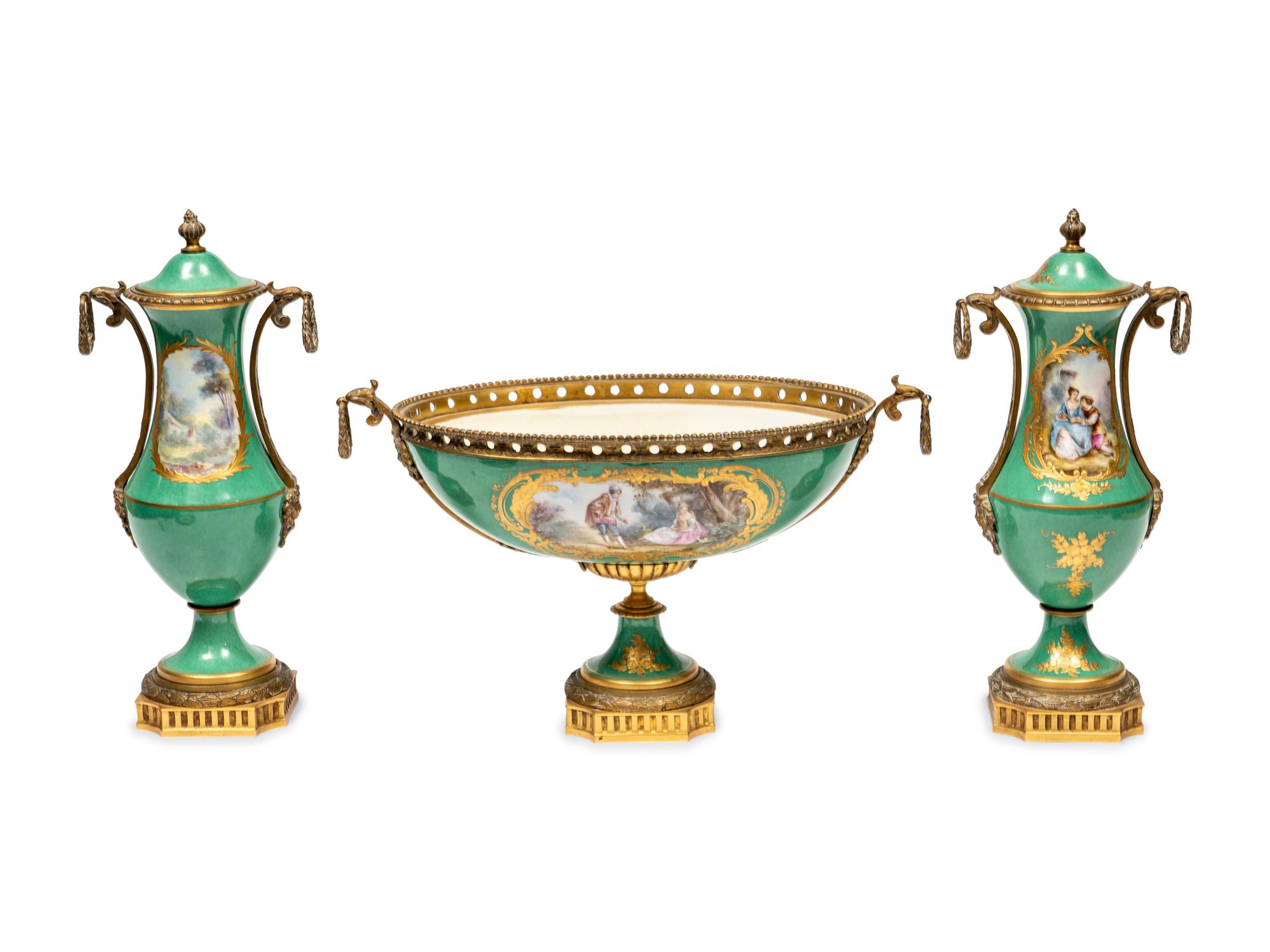 A Gilt Metal Mounted Sèvres Style Porcelain Three-Piece Garniture