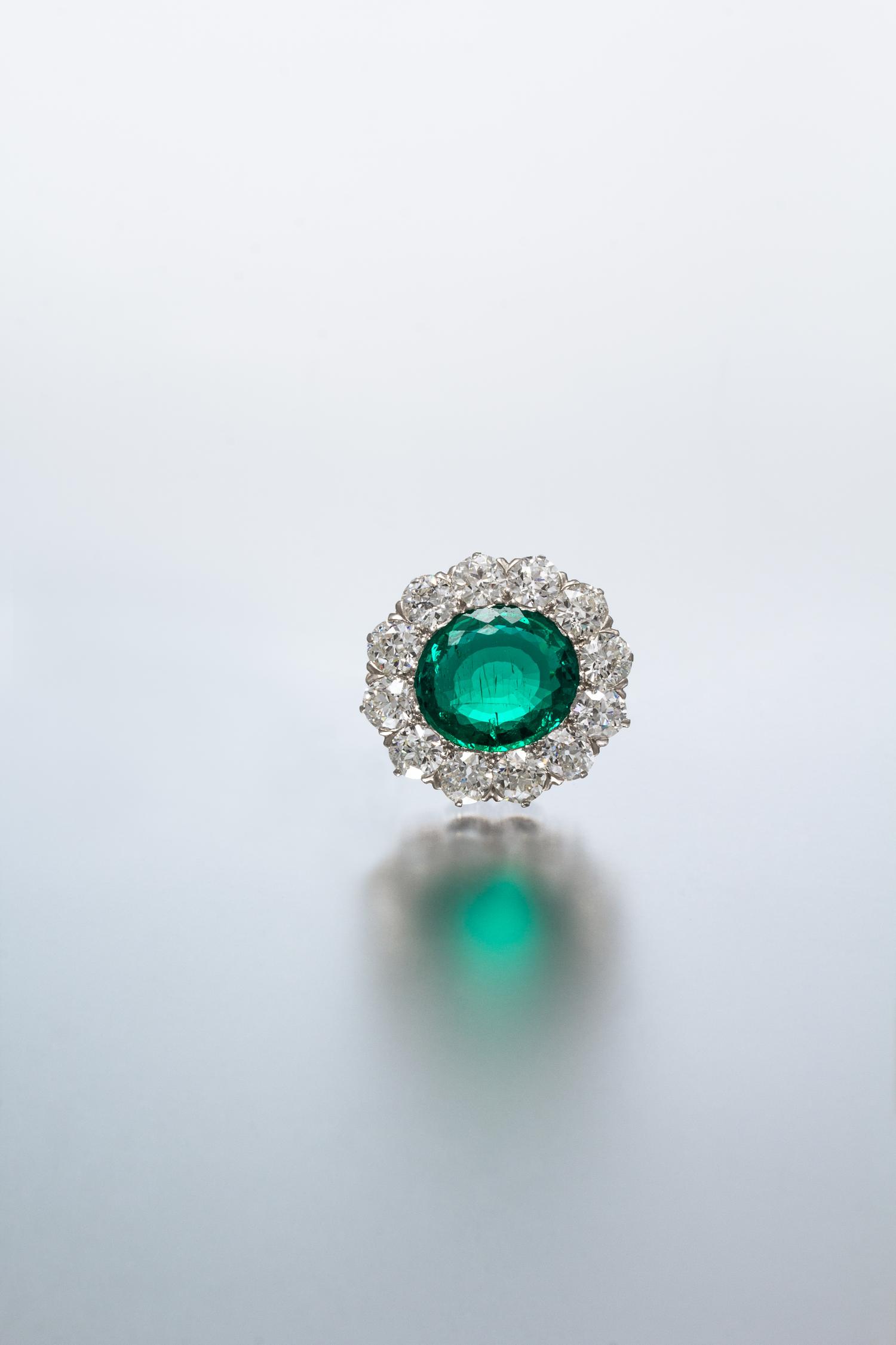 A Fine Platinum, Yellow Gold, Emerald and Diamond Brooch, Tiffany & Co., Circa 1910, 5.50 dwts.