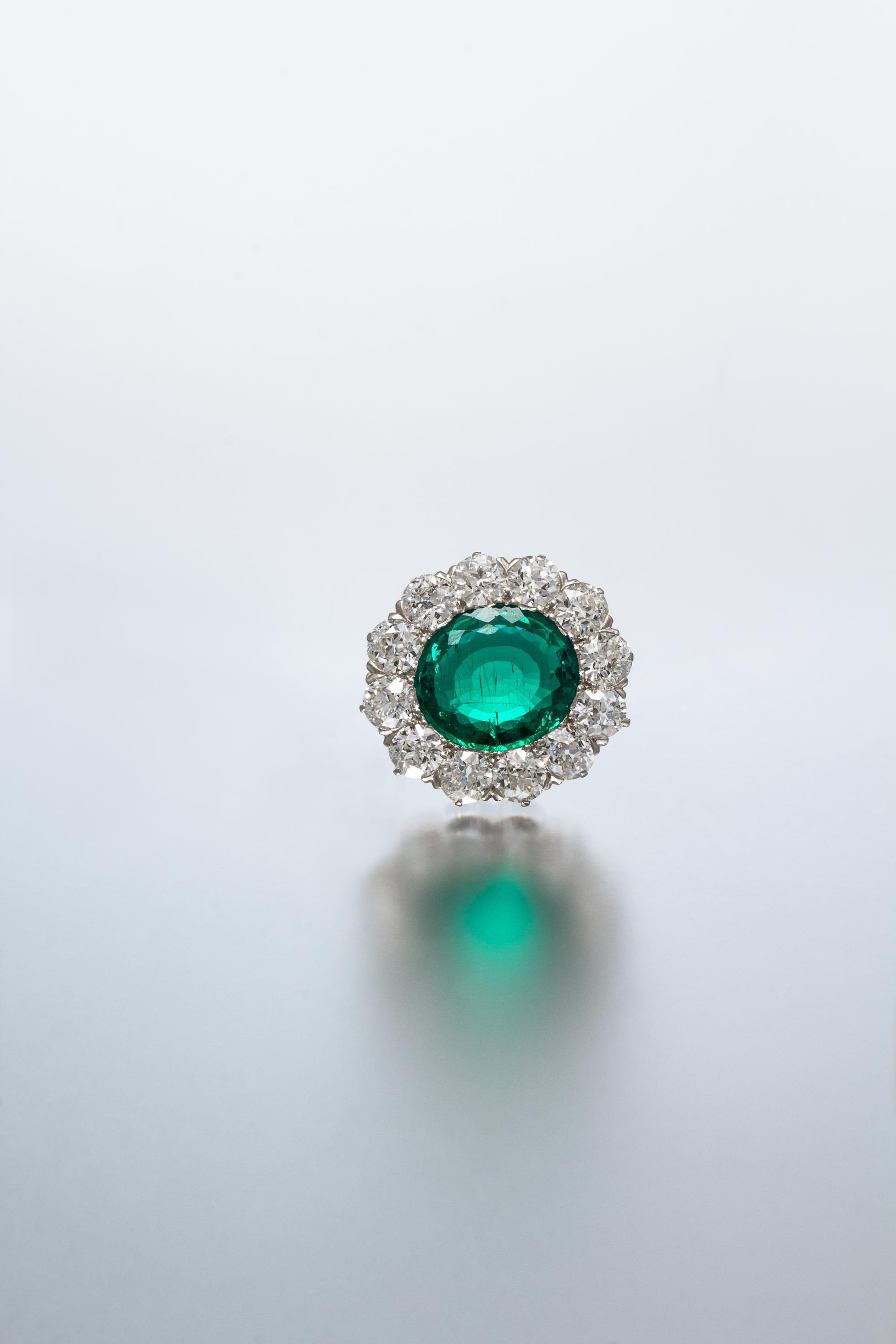 A Fine Platinum, Yellow Gold, Emerald and Diamond Brooch, Tiffany & Co., Circa 1910, 5.50 dwts.
