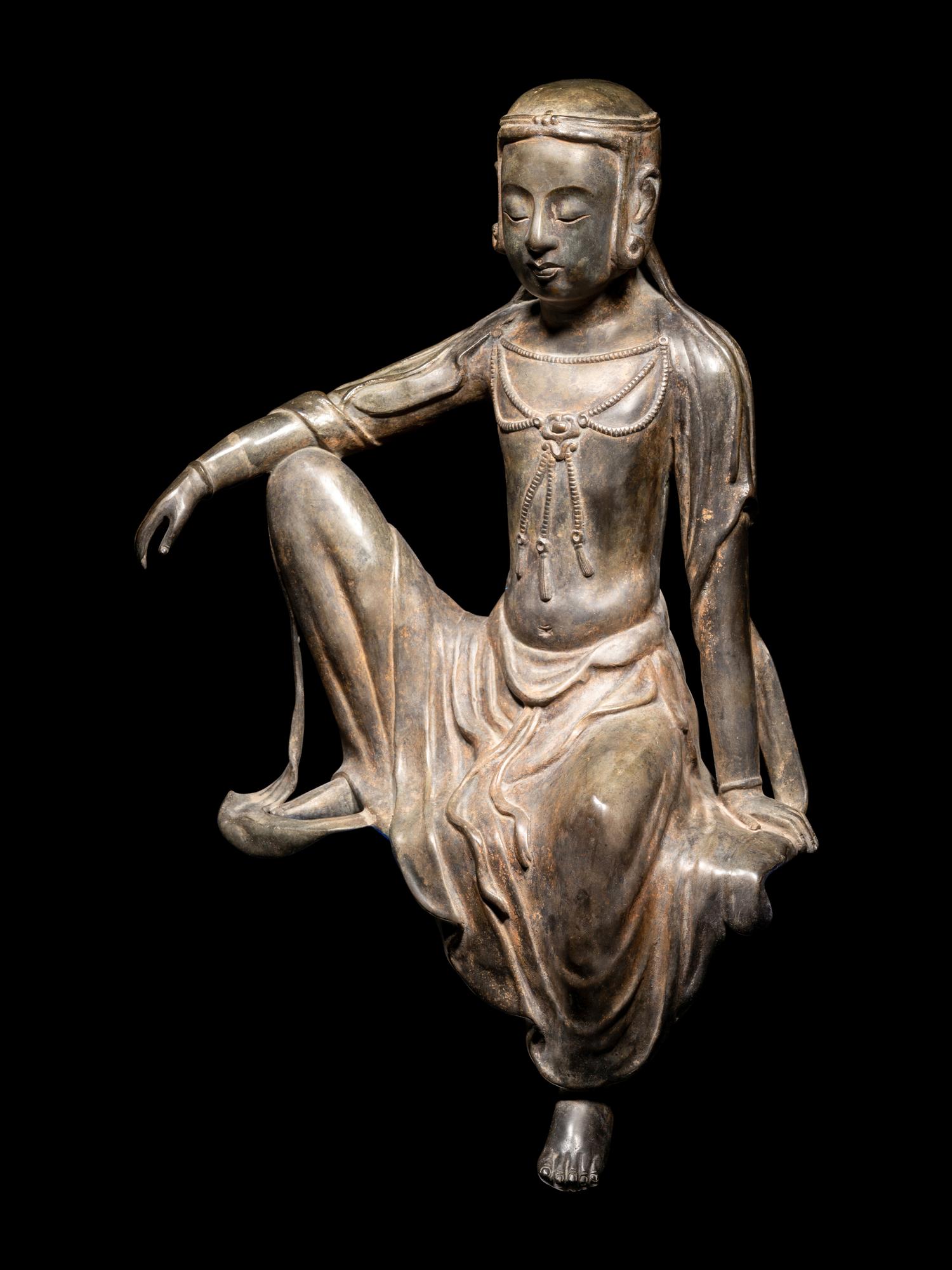 A Bronze Figure of Seated Buddha