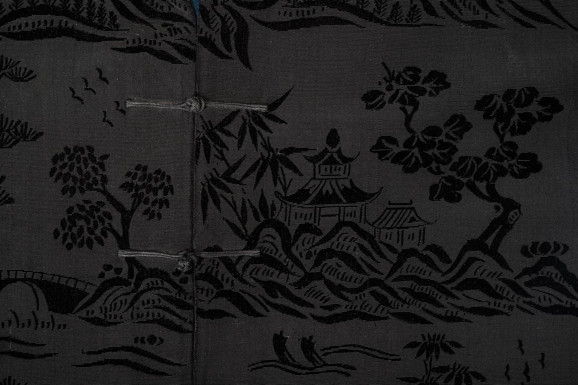 A Chinese Black Ground Silk Twill and Cut Velvet Jacket