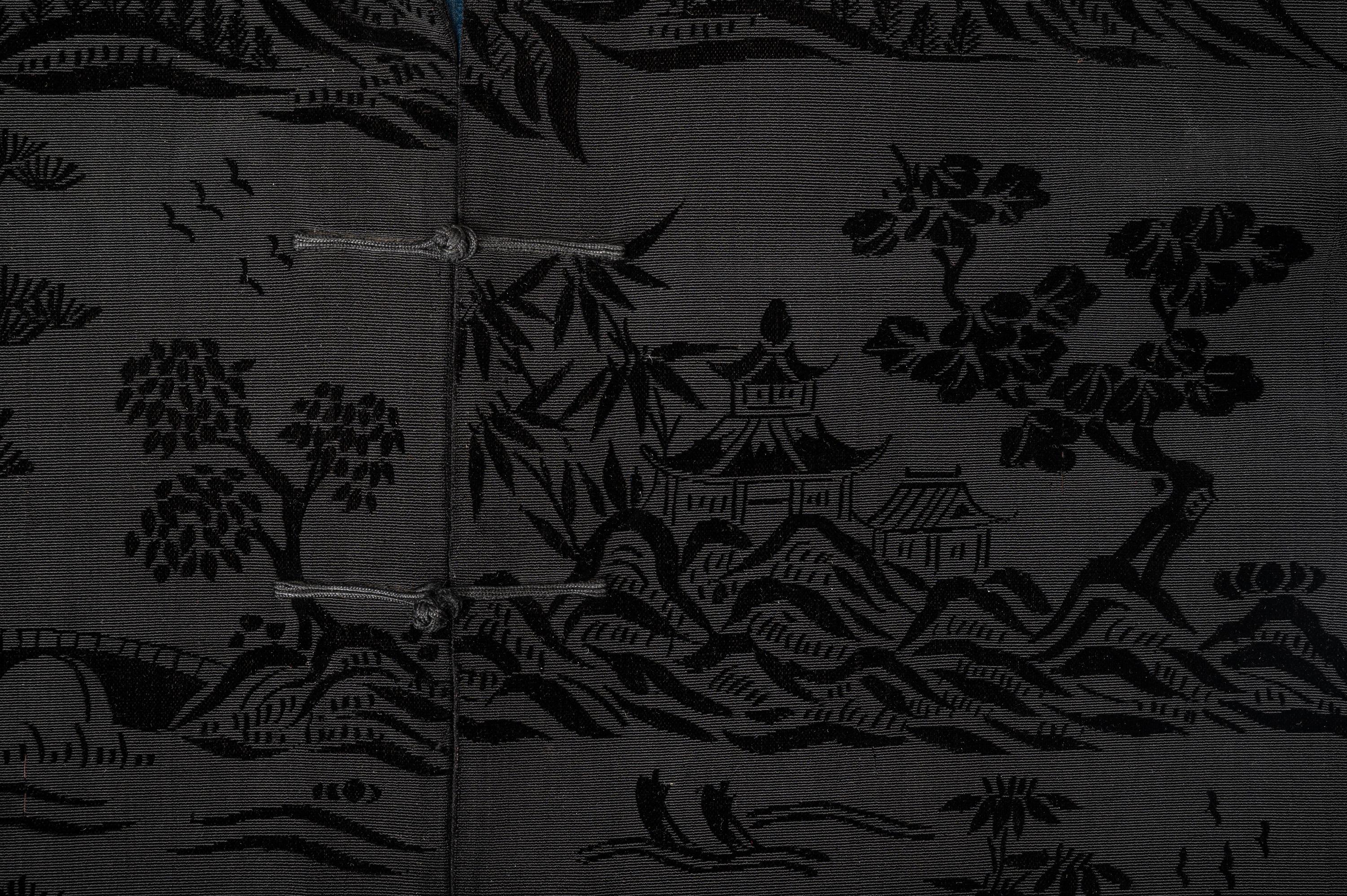 A Chinese Black Ground Silk Twill and Cut Velvet Jacket