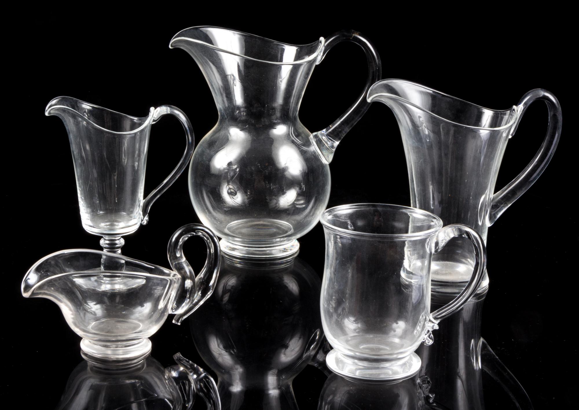 A Collection of Steuben Serving Articles Height of tallest 8 1/4 inches.