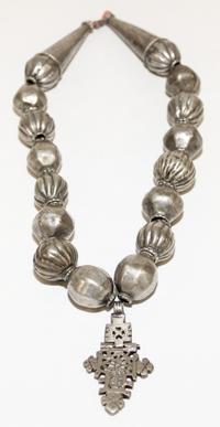 A Silver and Coral Beaded Necklace Length of chain 18 1/2 inches.
