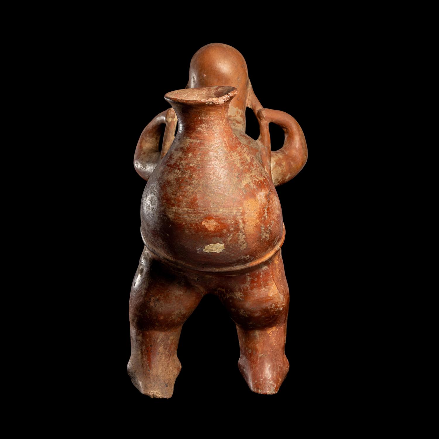A Colima Terracotta Cup Bearer