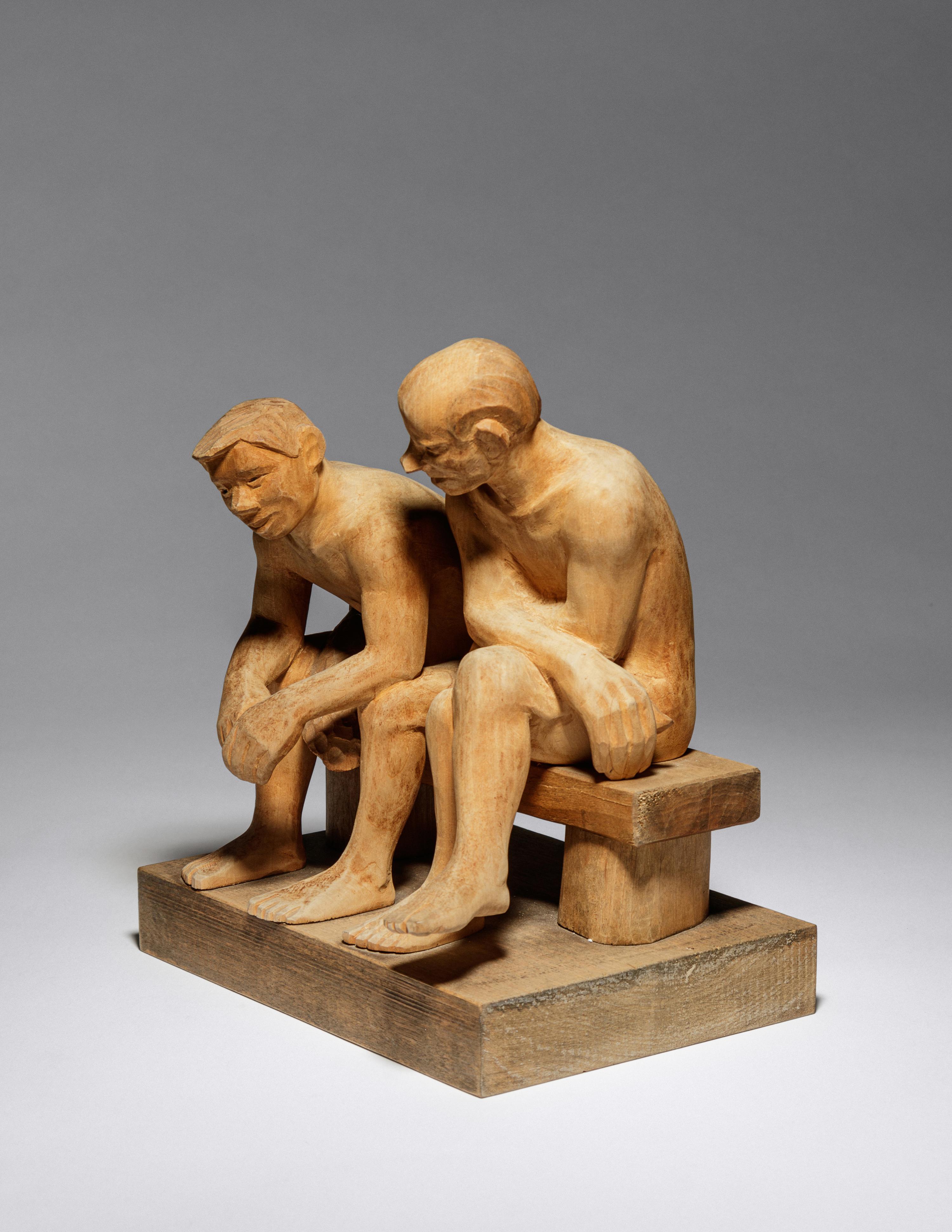 Two Seated Figures