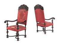 A Pair of William and Mary Style Carved Walnut Armchairs