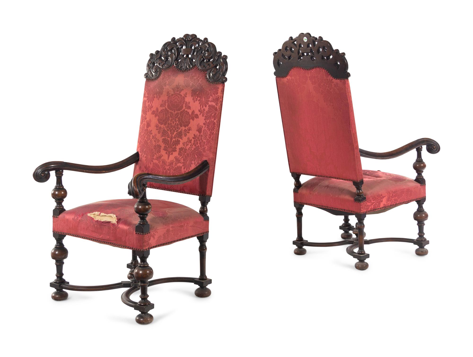 A Pair of William and Mary Style Carved Walnut Armchairs