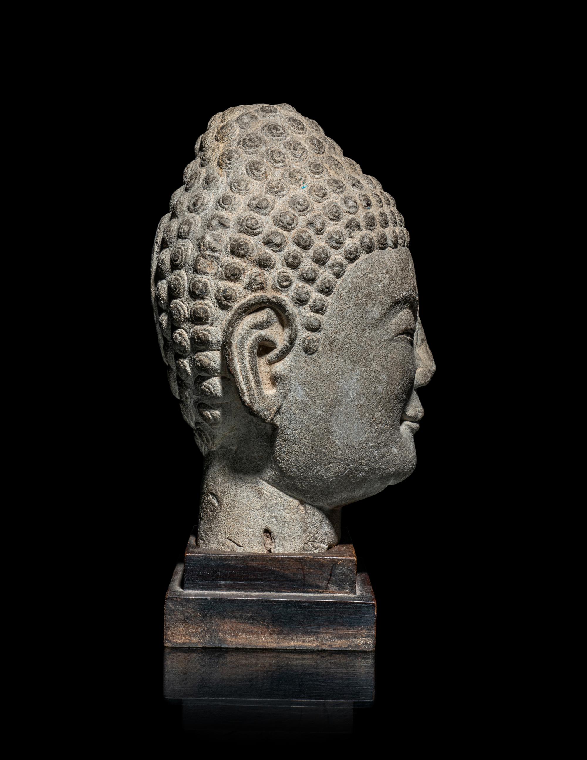 A Chinese Carved Stone Head of Buddha