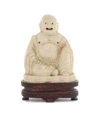 A White Glazed Porcelain Figure of Mile Buddha Height 3 3/4 inches.