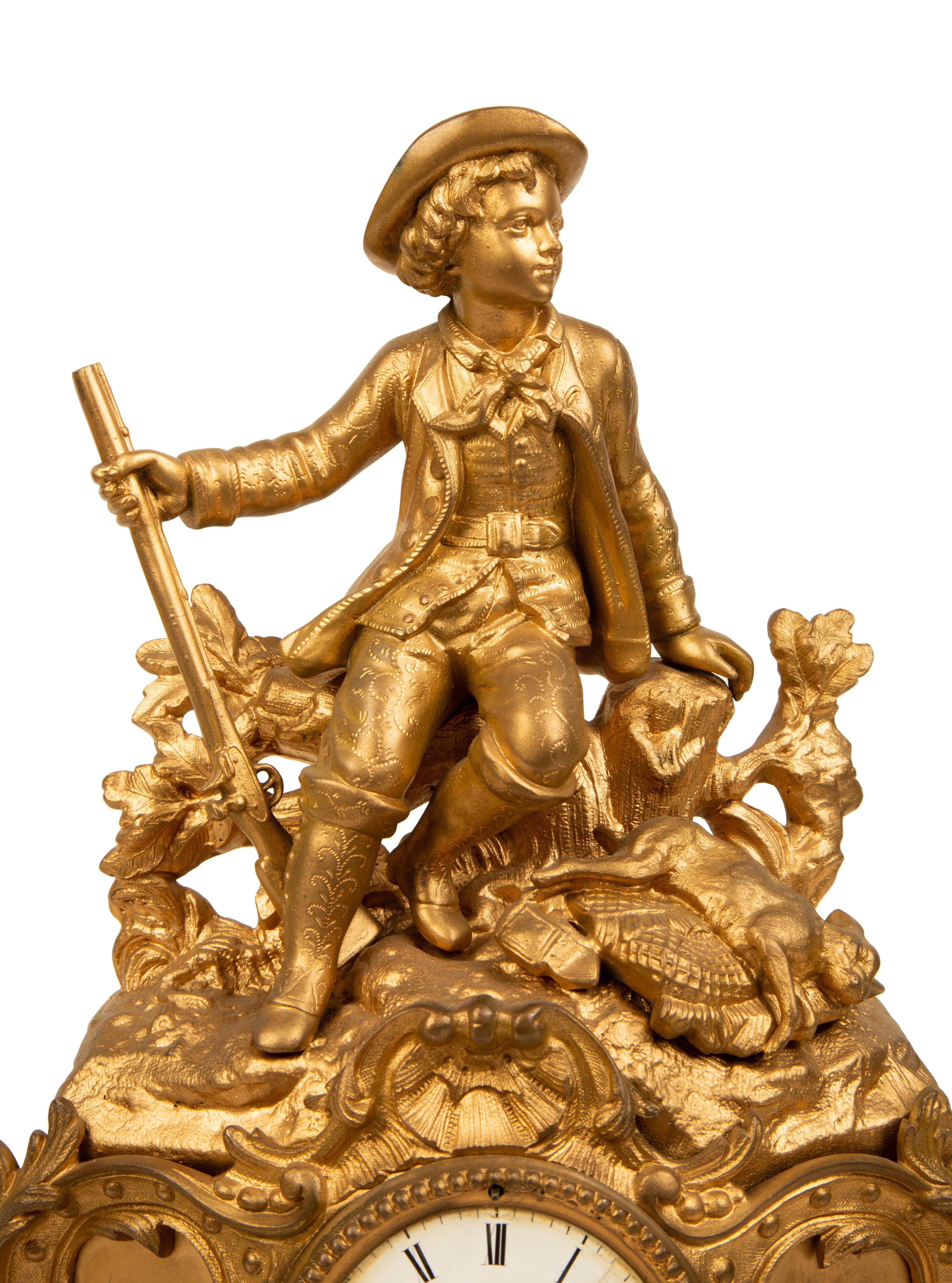 A French Gilt Metal Figural Clock — LATE 19TH CENTURY