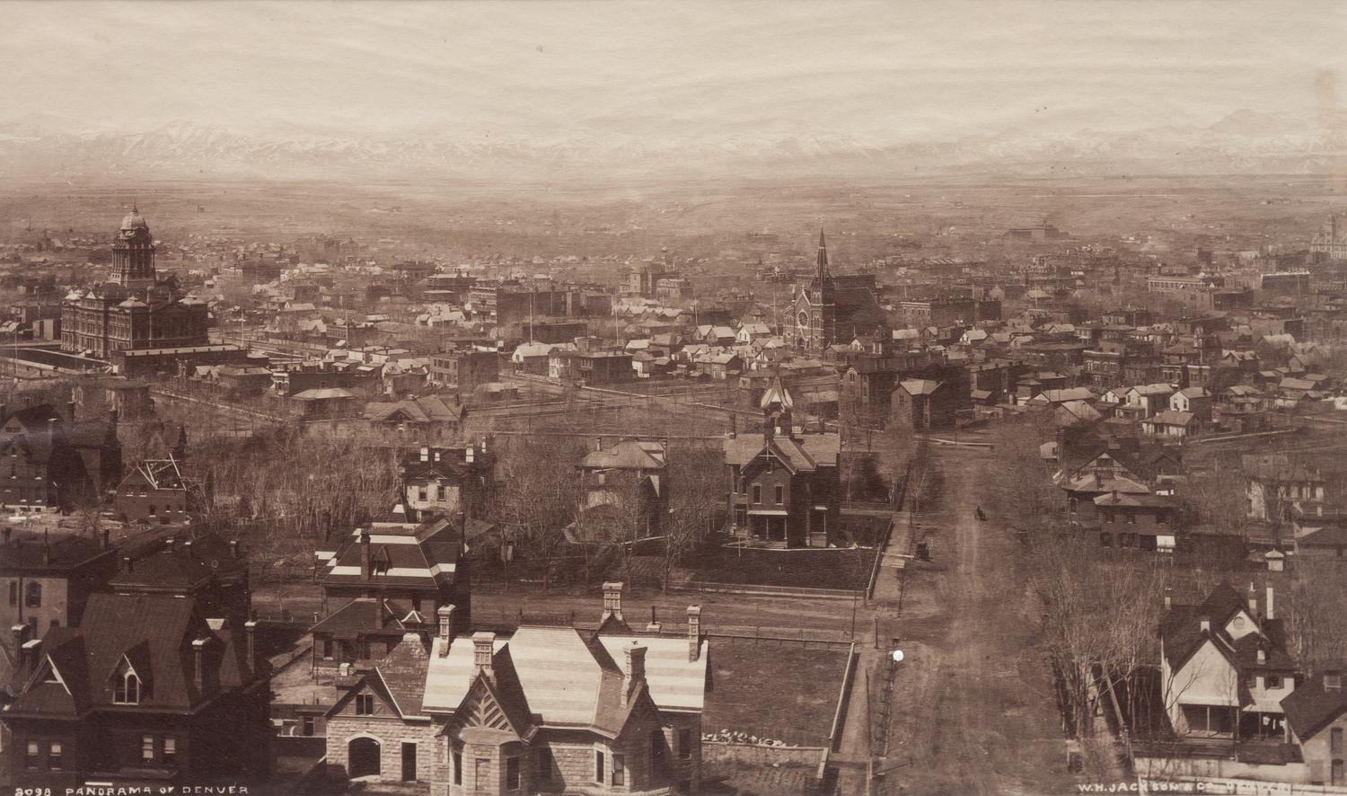 A group of four photographs (8098. Panorama of Denver; Untitled (roof tops of a town; Untitled (mining town); Georgetown)