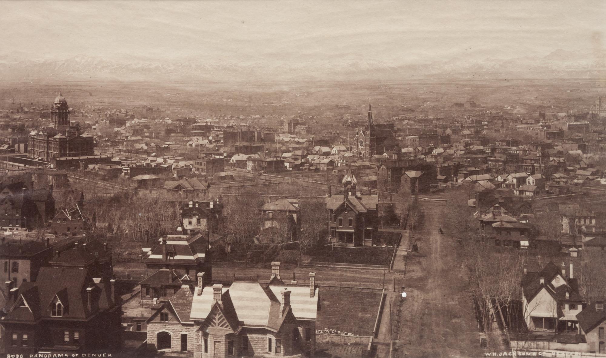 A group of four photographs (8098. Panorama of Denver; Untitled (roof tops of a town; Untitled (mining town); Georgetown)
