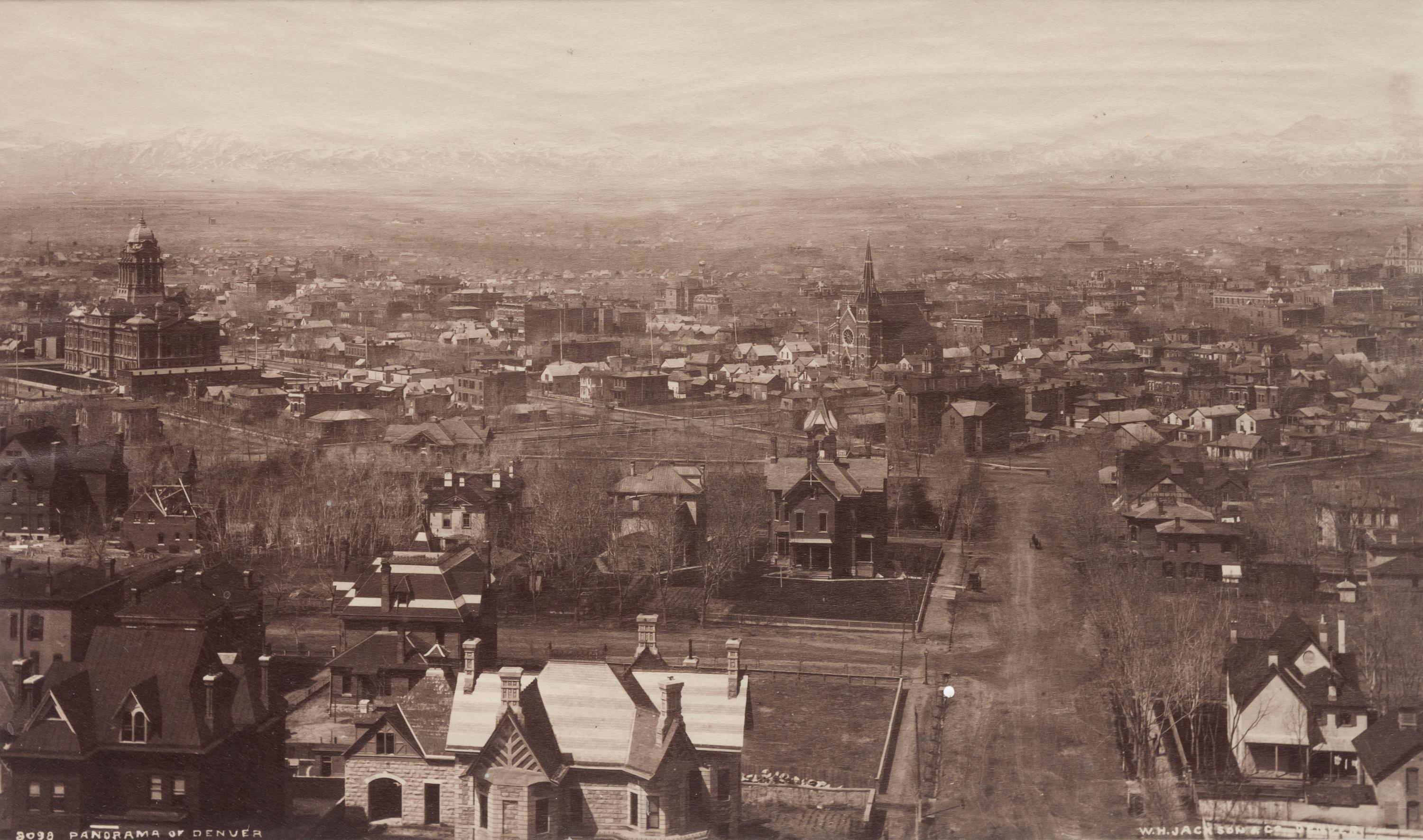 A group of four photographs (8098. Panorama of Denver; Untitled (roof tops of a town; Untitled (mining town); Georgetown)