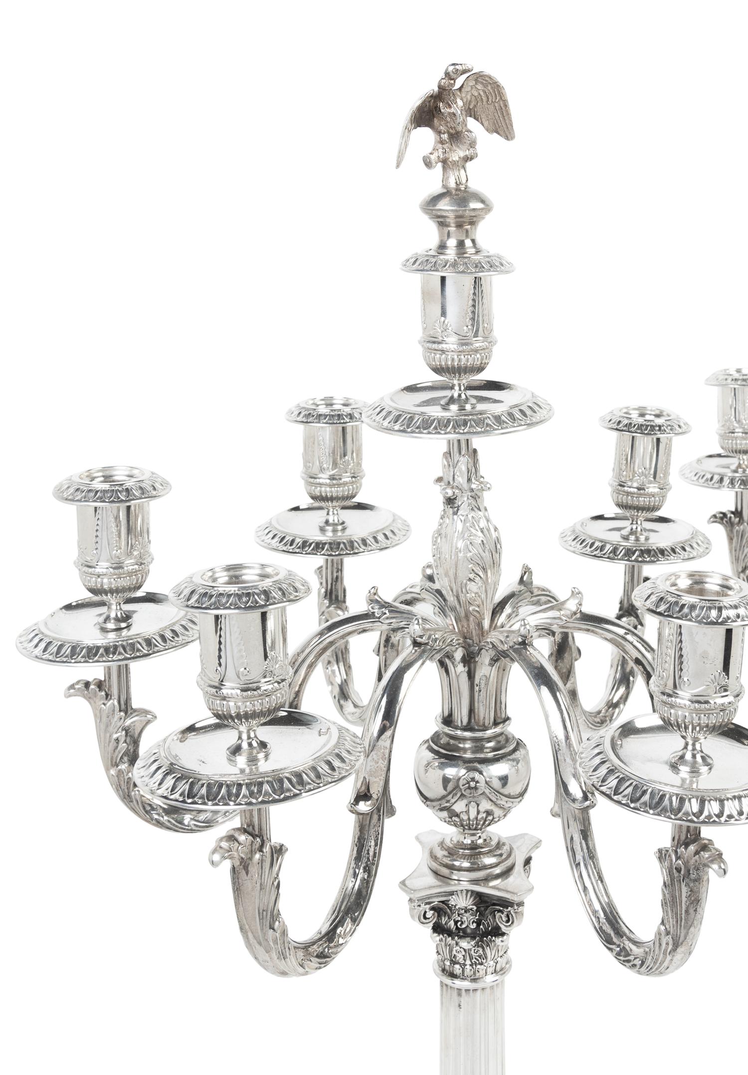 A Pair of German Silver Seven-Light Candelabra, Josef Krischer Nachfolger, Dusseldorf, Early 20th Century, the fluted columnar standard