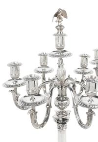 A Pair of German Silver Seven-Light Candelabra, Josef Krischer Nachfolger, Dusseldorf, Early 20th Century, the fluted columnar standard