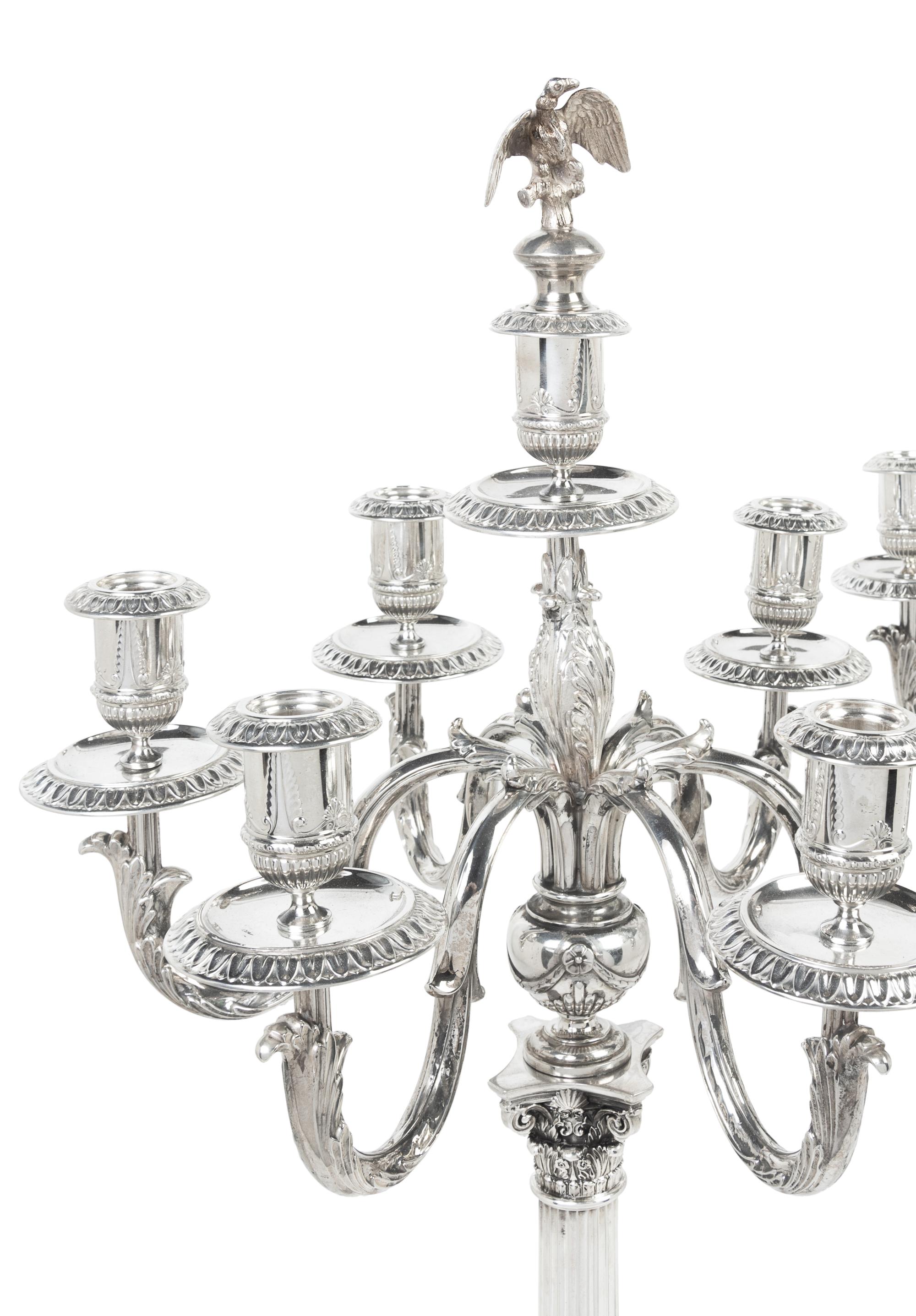 A Pair of German Silver Seven-Light Candelabra, Josef Krischer Nachfolger, Dusseldorf, Early 20th Century, the fluted columnar standard