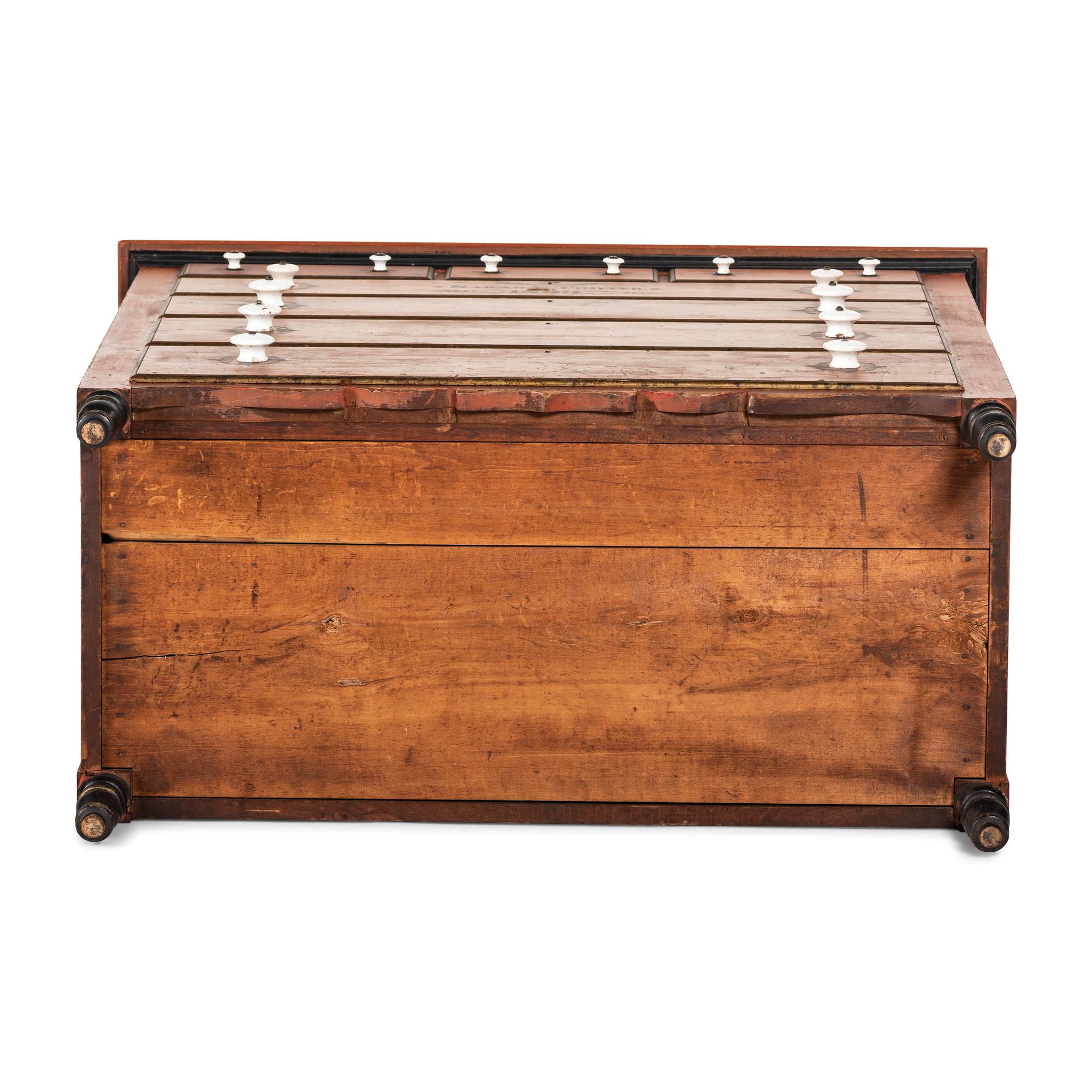 A Mennonite Red Wash, Black and Parcel Gilt Painted, Stencil Decorated Poplar Chest of Drawers