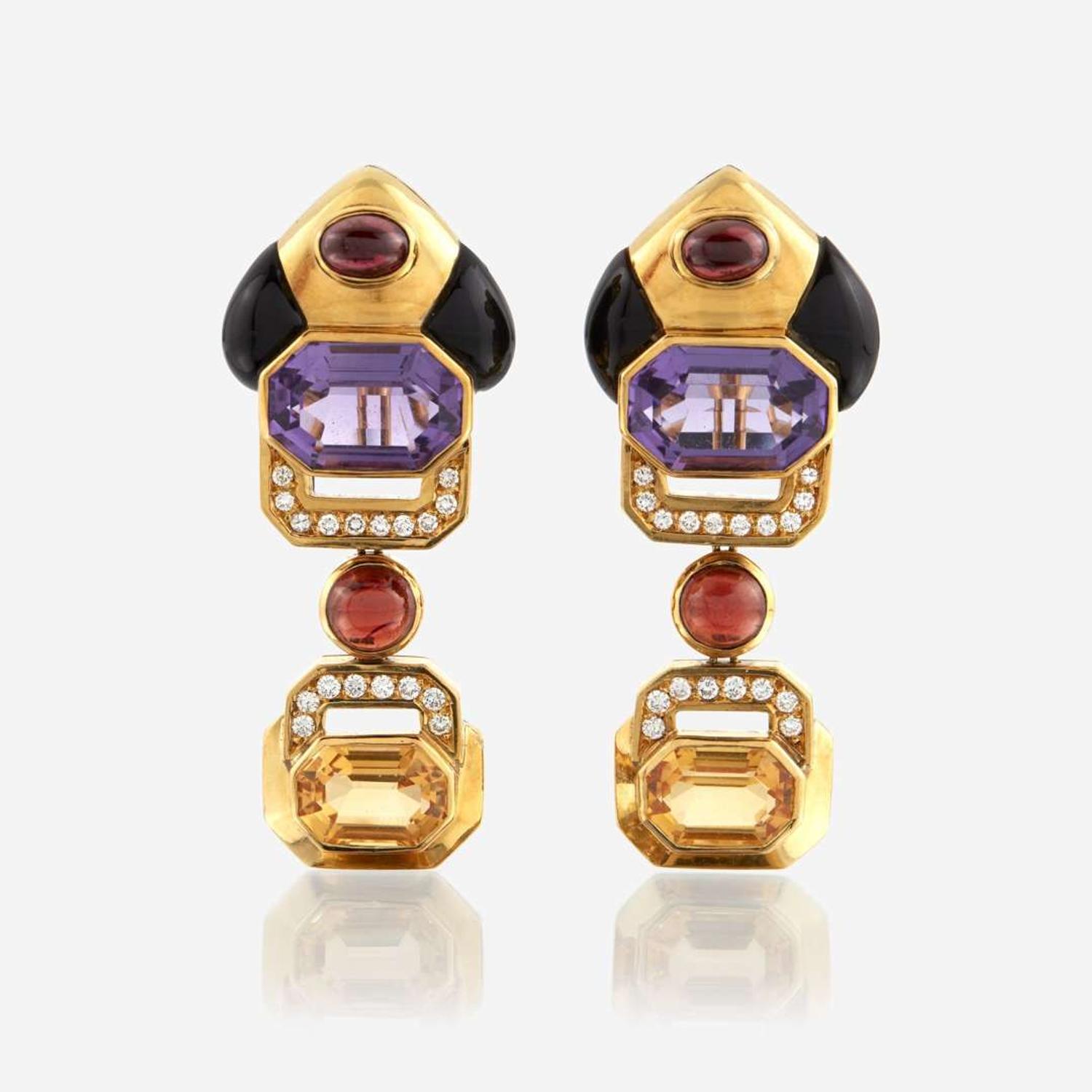 A pair of eighteen karat gold and gem-set ear pendants