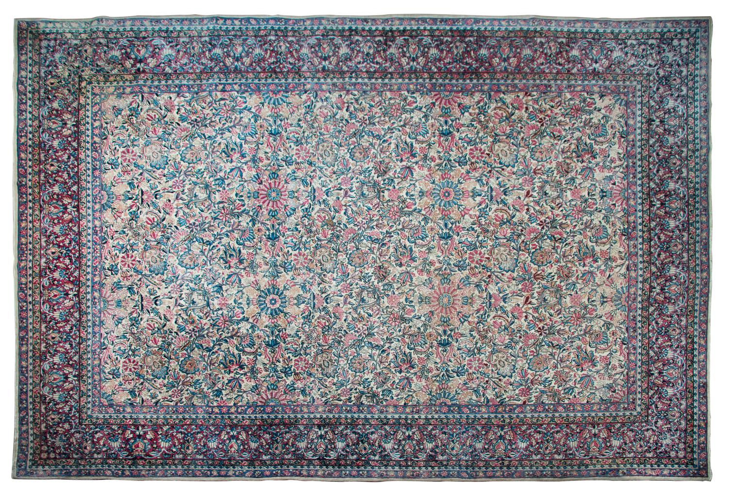 A Lavar Kirman Wool Rug 13 feet 6 inches x 9 feet 9 1/2 inches.