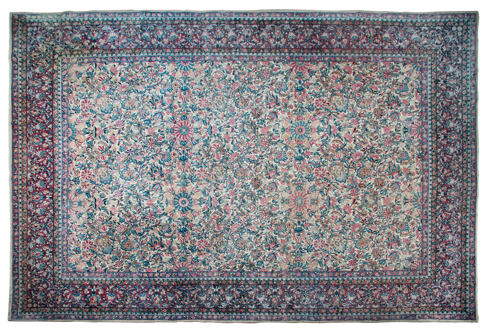 A Lavar Kirman Wool Rug 13 feet 6 inches x 9 feet 9 1/2 inches.