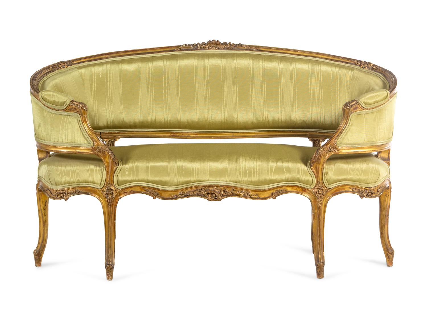 A Louis XV Style Carved Giltwood Settee