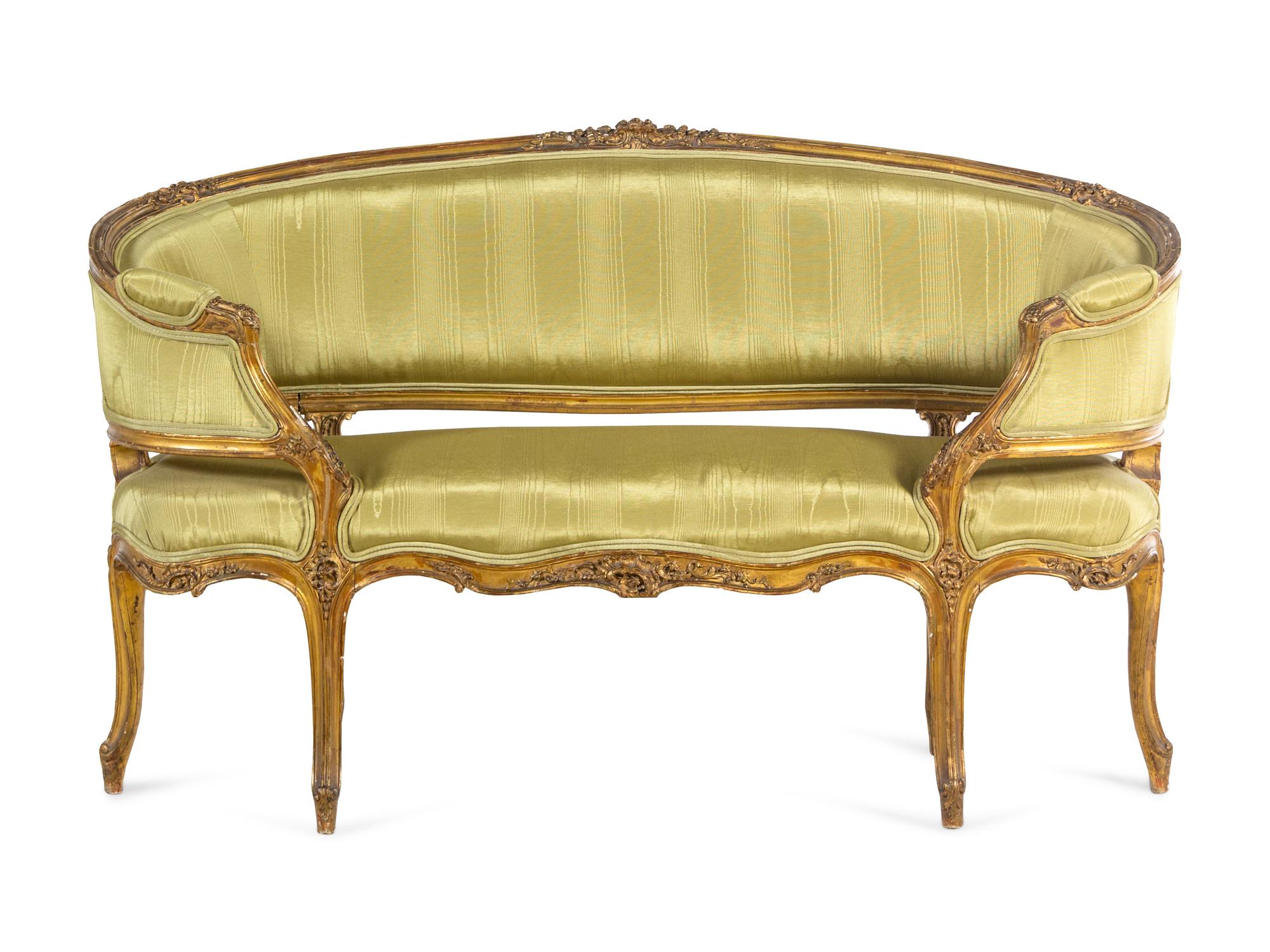 A Louis XV Style Carved Giltwood Settee