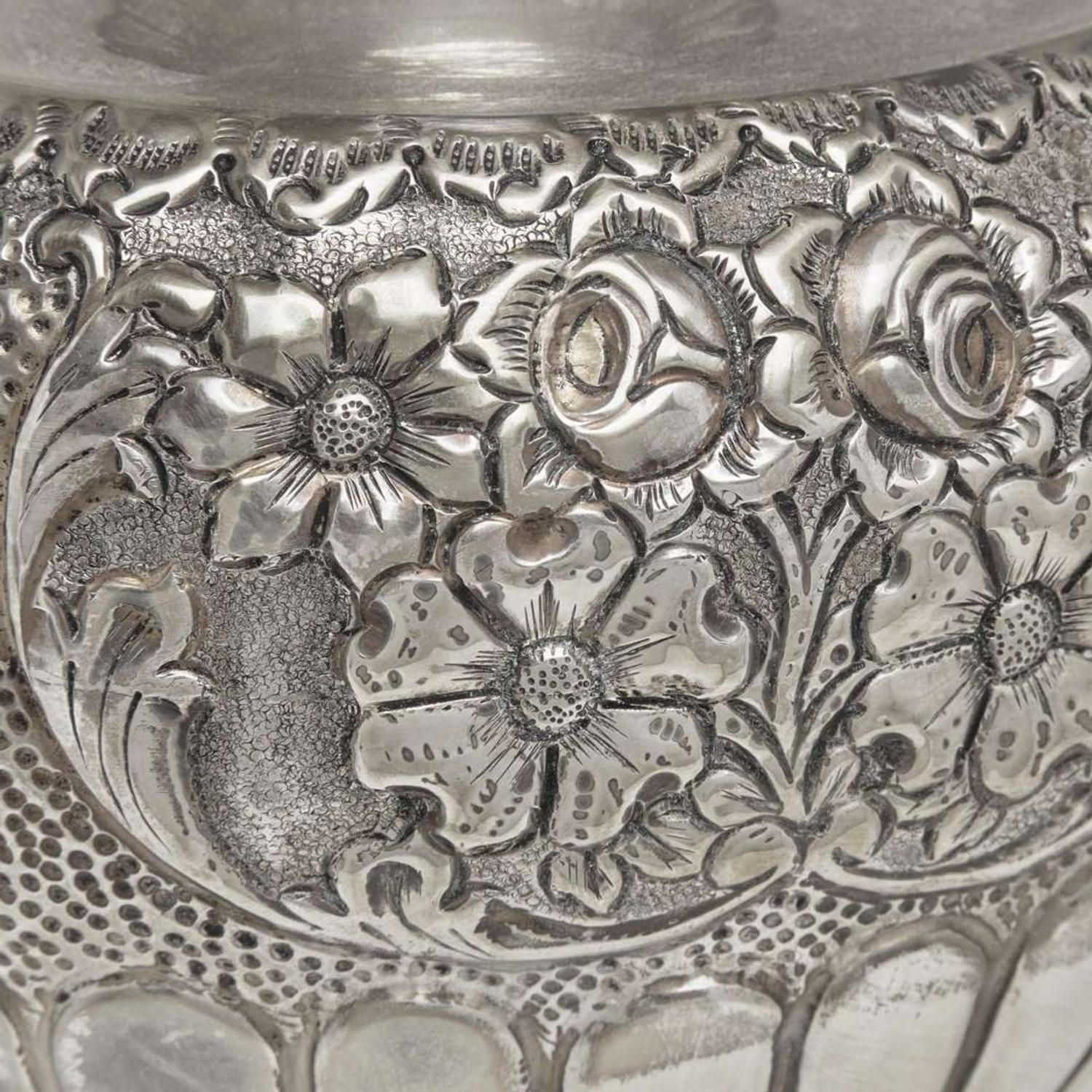 A large sterling silver floral repoussé vase late 19th / early 20th century