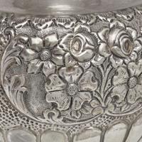 A large sterling silver floral repoussé vase late 19th / early 20th century