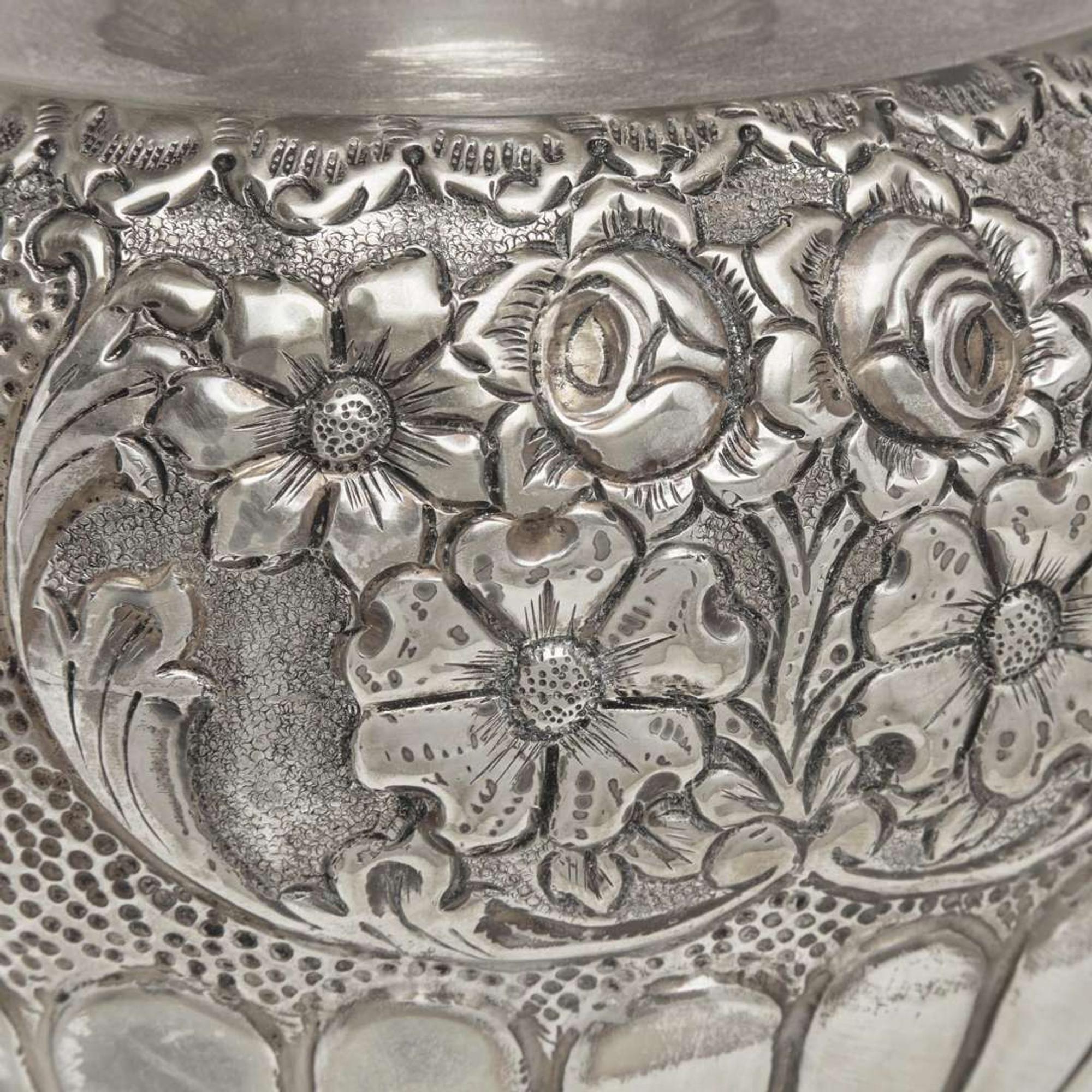A large sterling silver floral repoussé vase late 19th / early 20th century