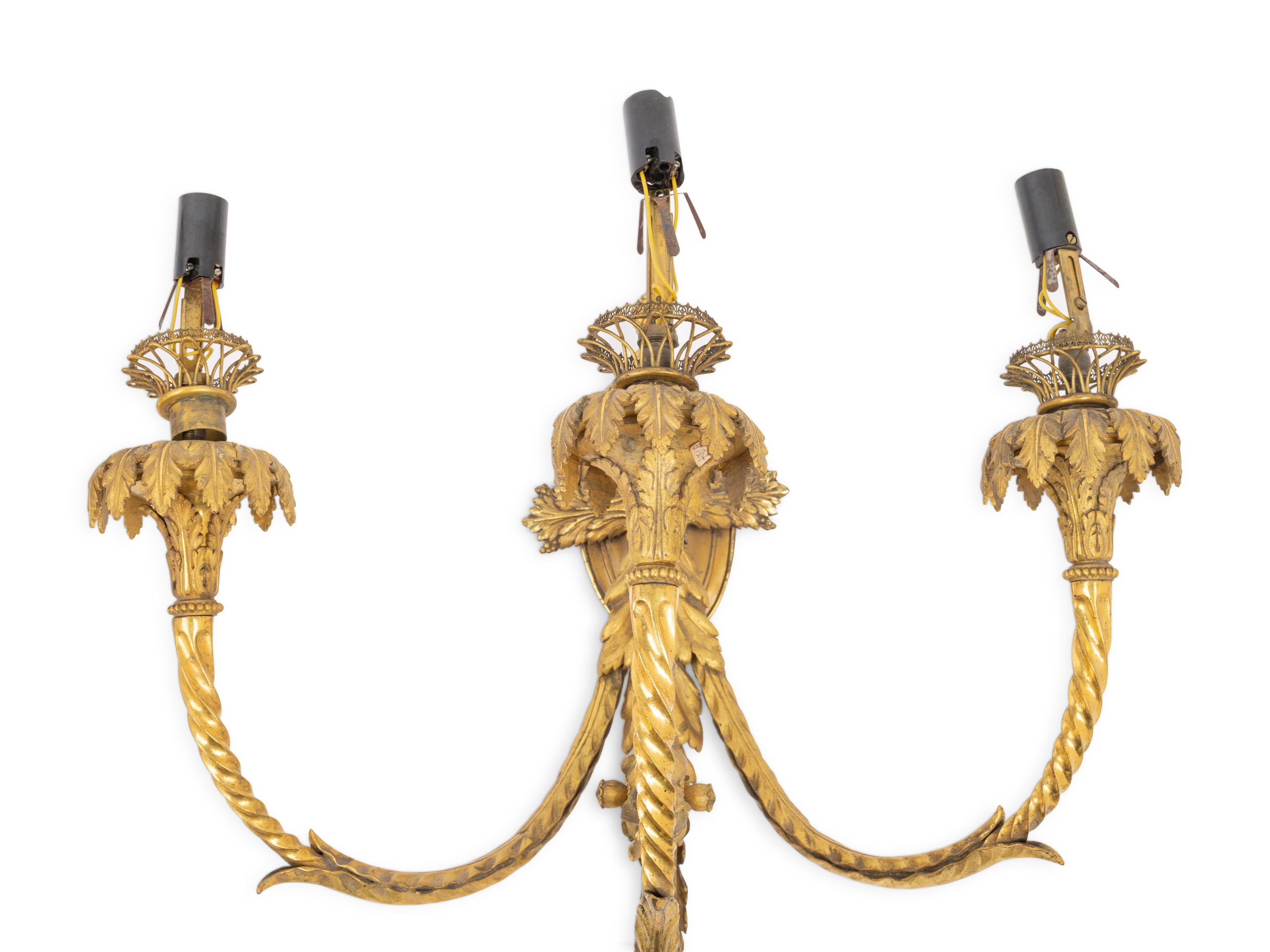 A Pair of Napoleon III Gilt Bronze Three-Light Sconces