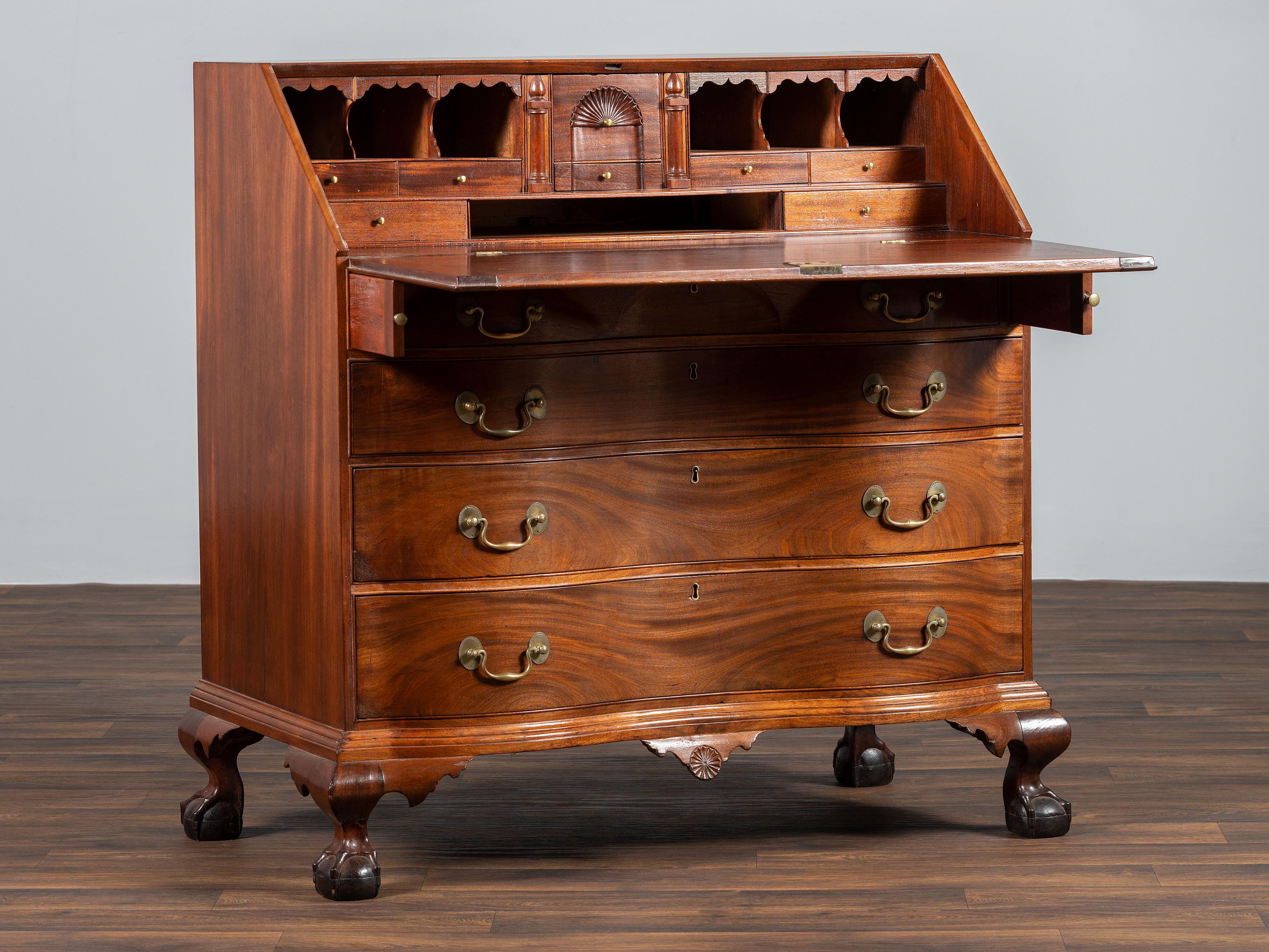A Chippendale Carved Mahogany Reverse Serpentine Block-Front Desk